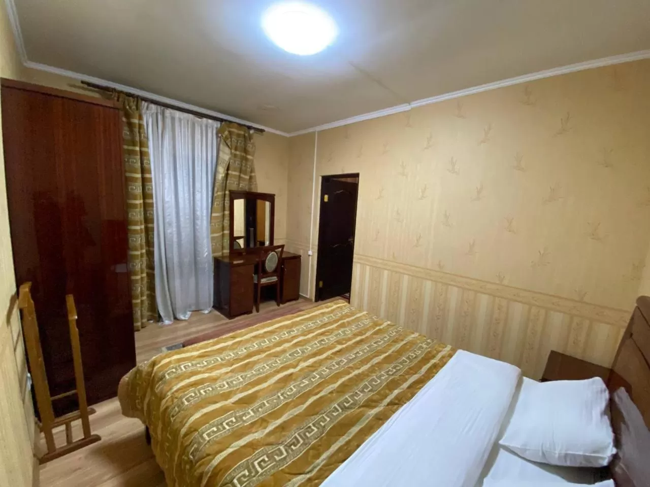 Bed in Deluxe SPA-Hotel