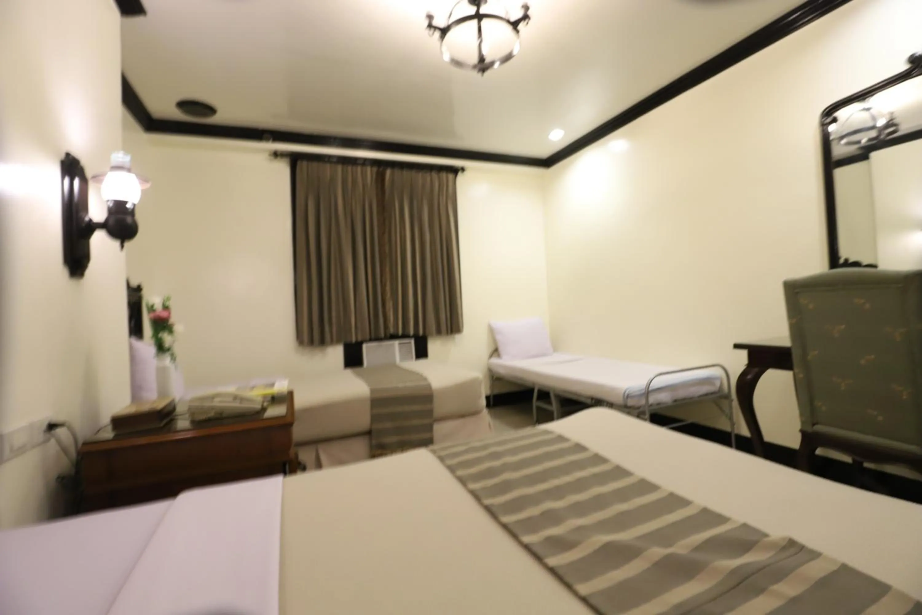 Bed in Camelot Hotel