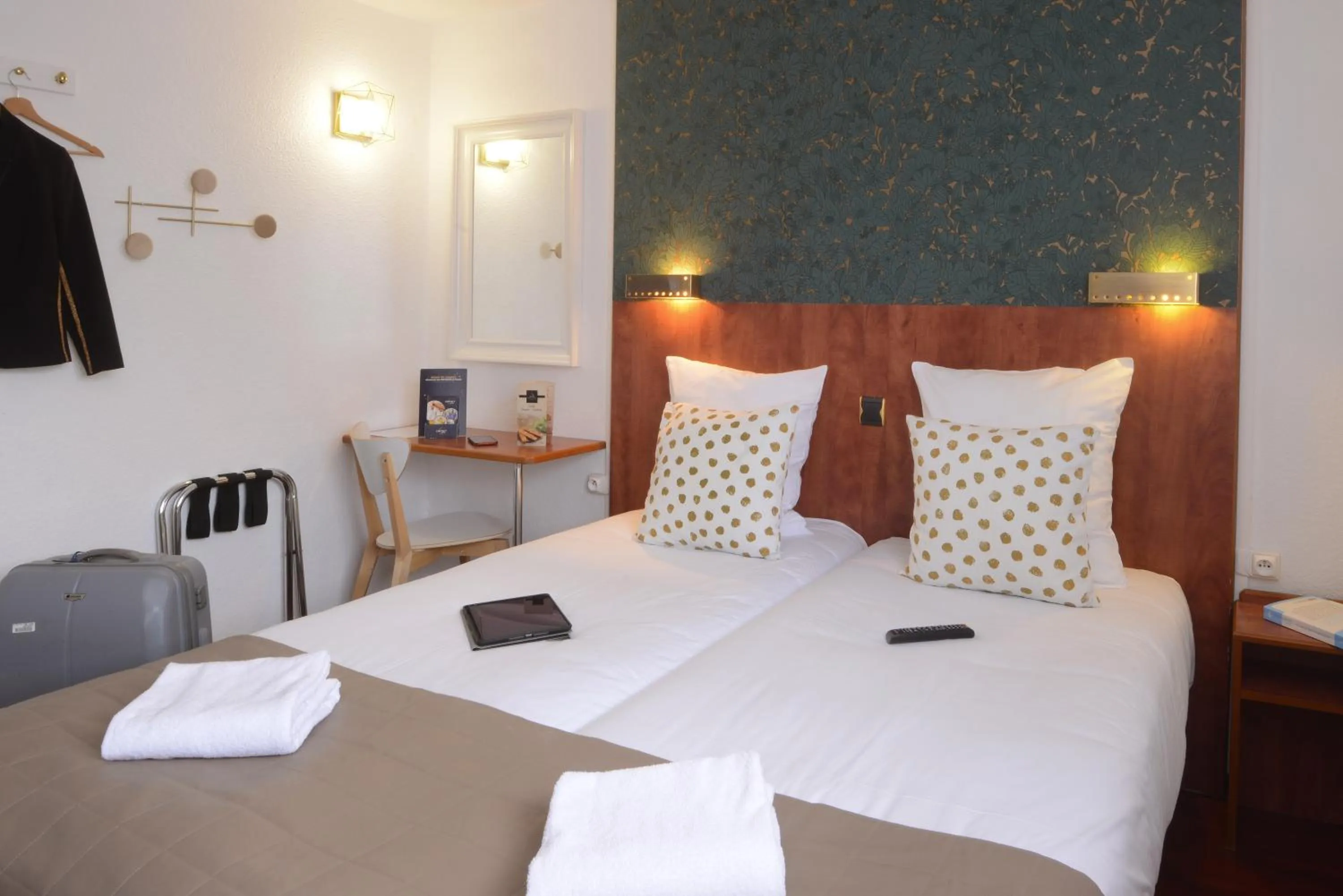 View (from property/room), Bed in Hotel Arc-En-Ciel Colmar Contact Hotel