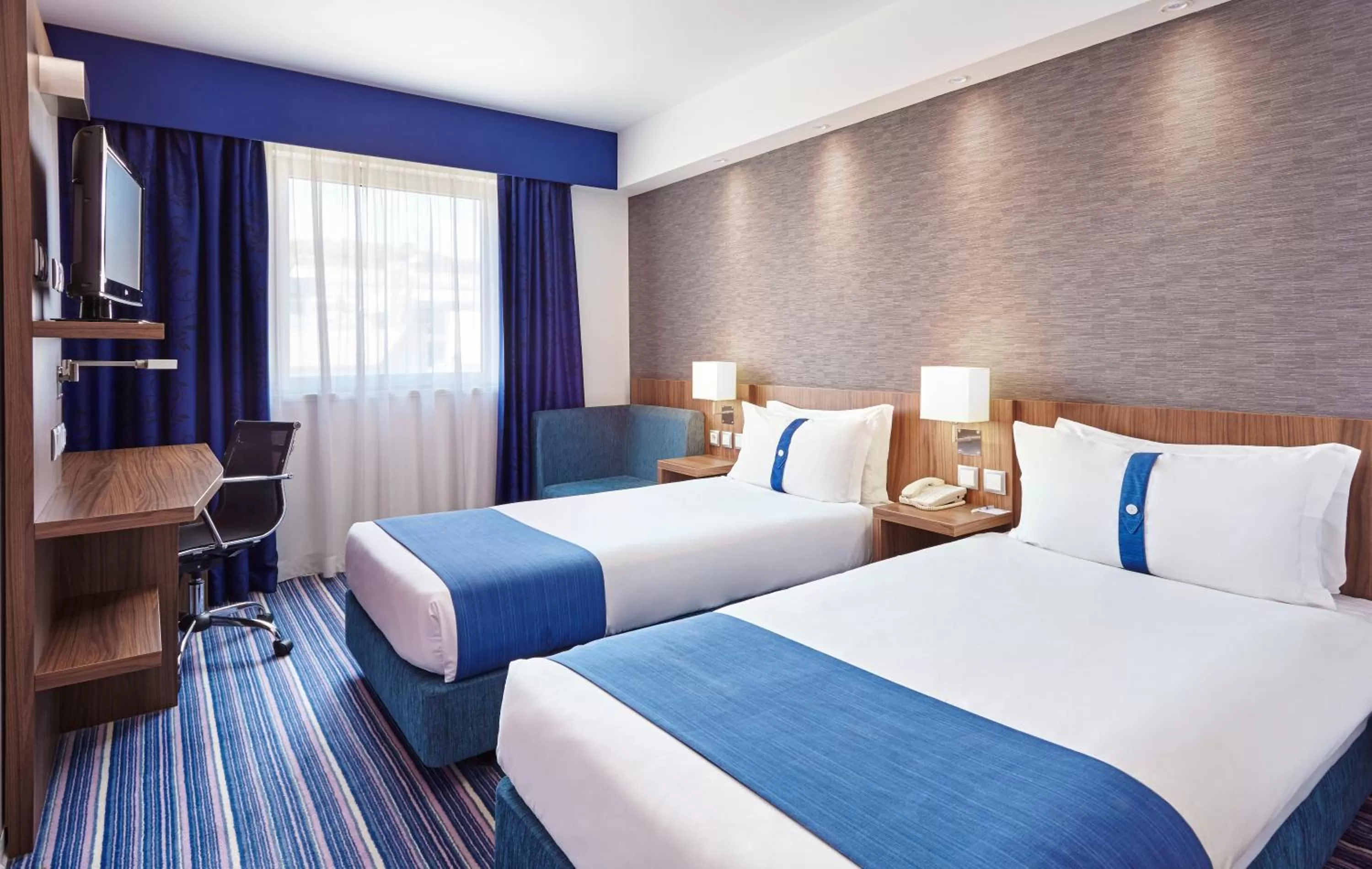 Photo of the whole room, Bed in Holiday Inn Express Lisbon Alfragide by IHG