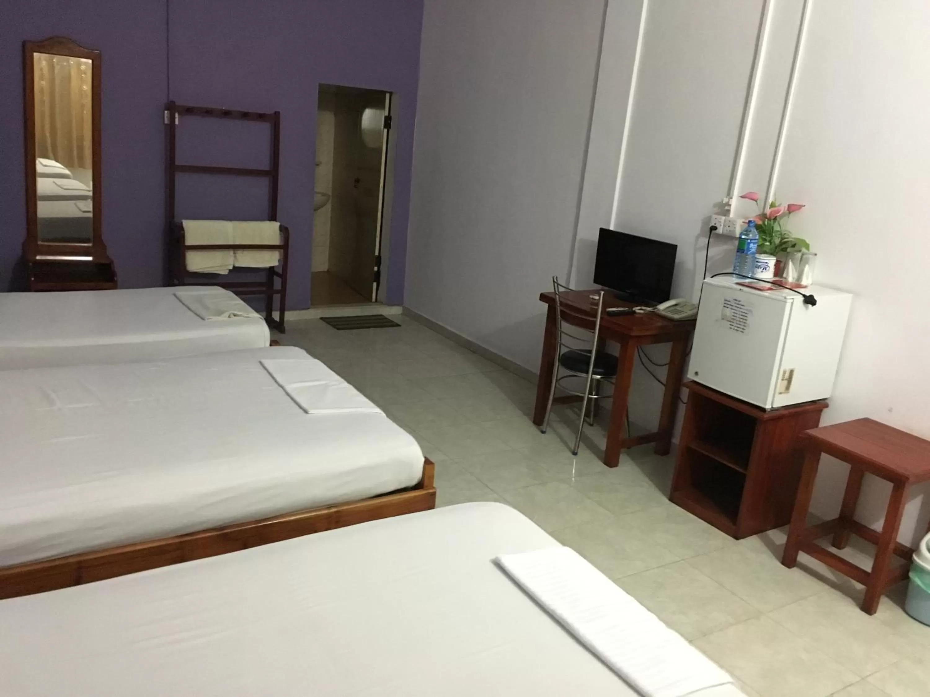 Bedroom, Bed in Gnaanams Hotel and Restaurant