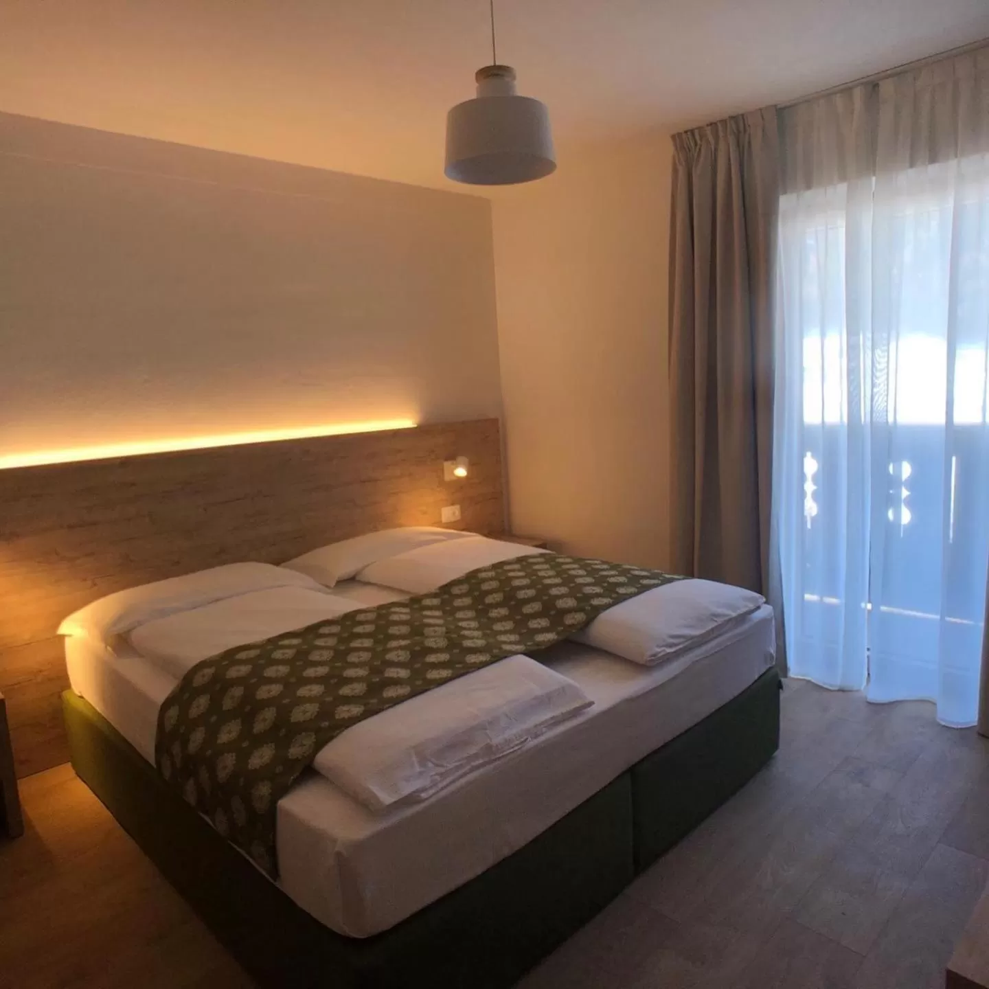 Bed in Hotel Kronplatzer Hof