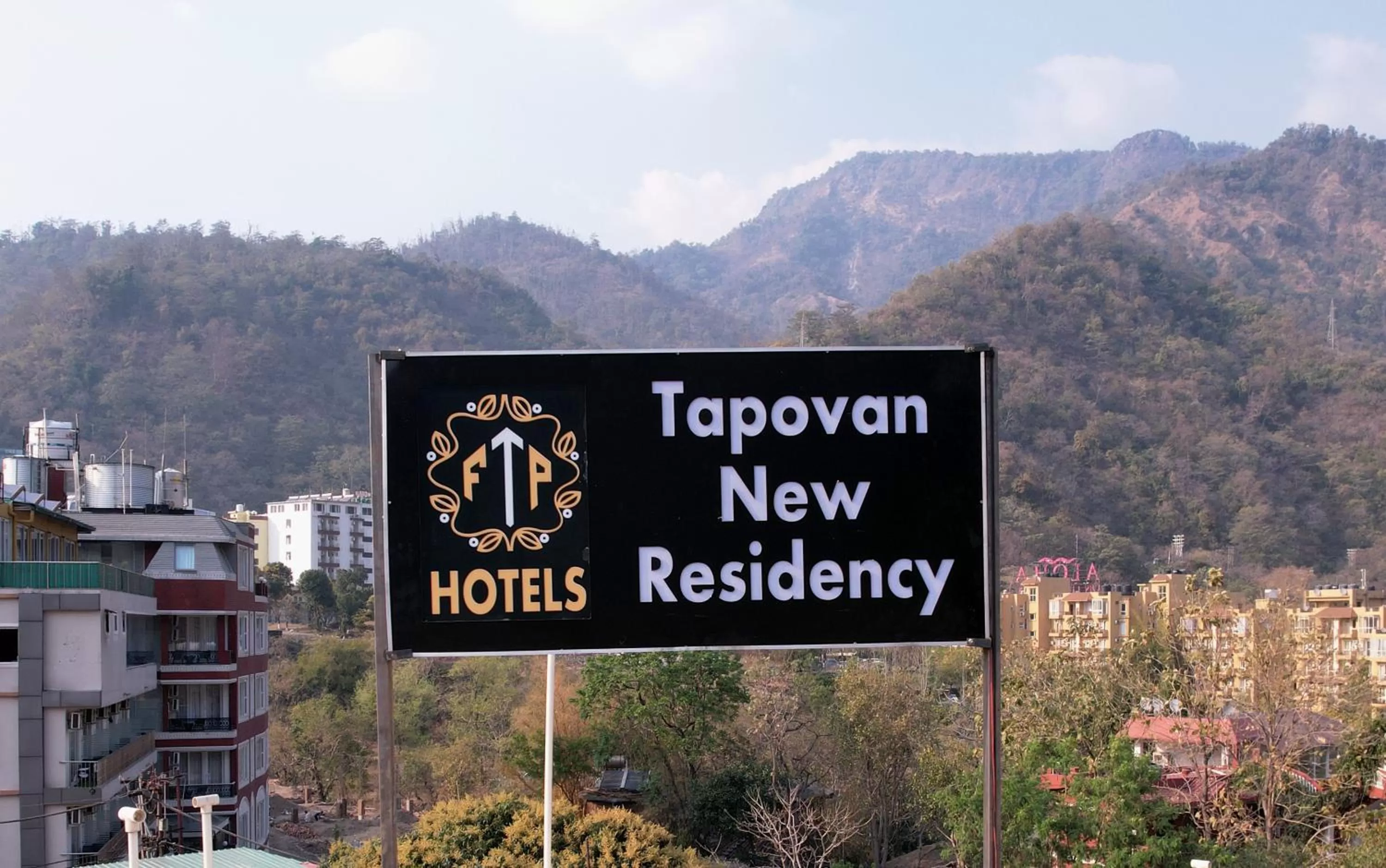 Property logo or sign in Tapovan New Residency - 5 minutes walk to Laxman jhula