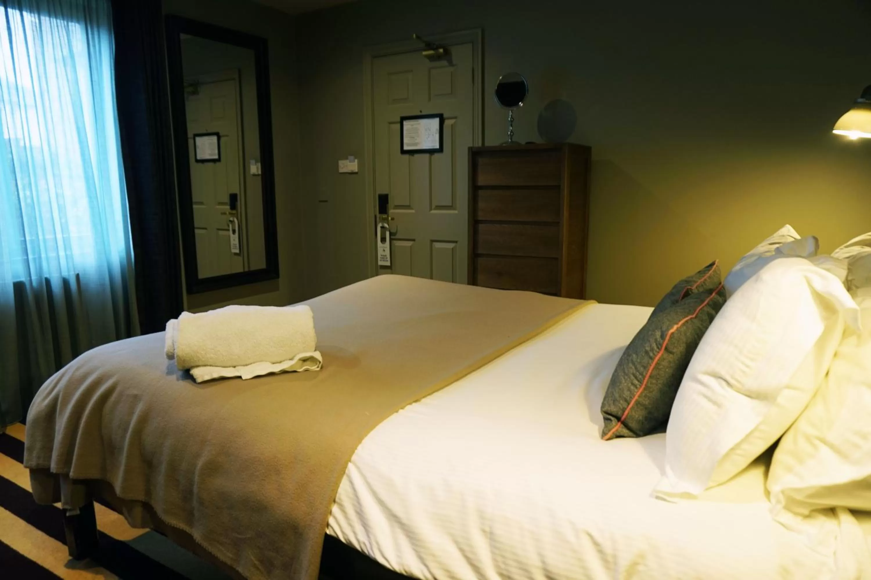 Bed in The Penny Farthing Hotel