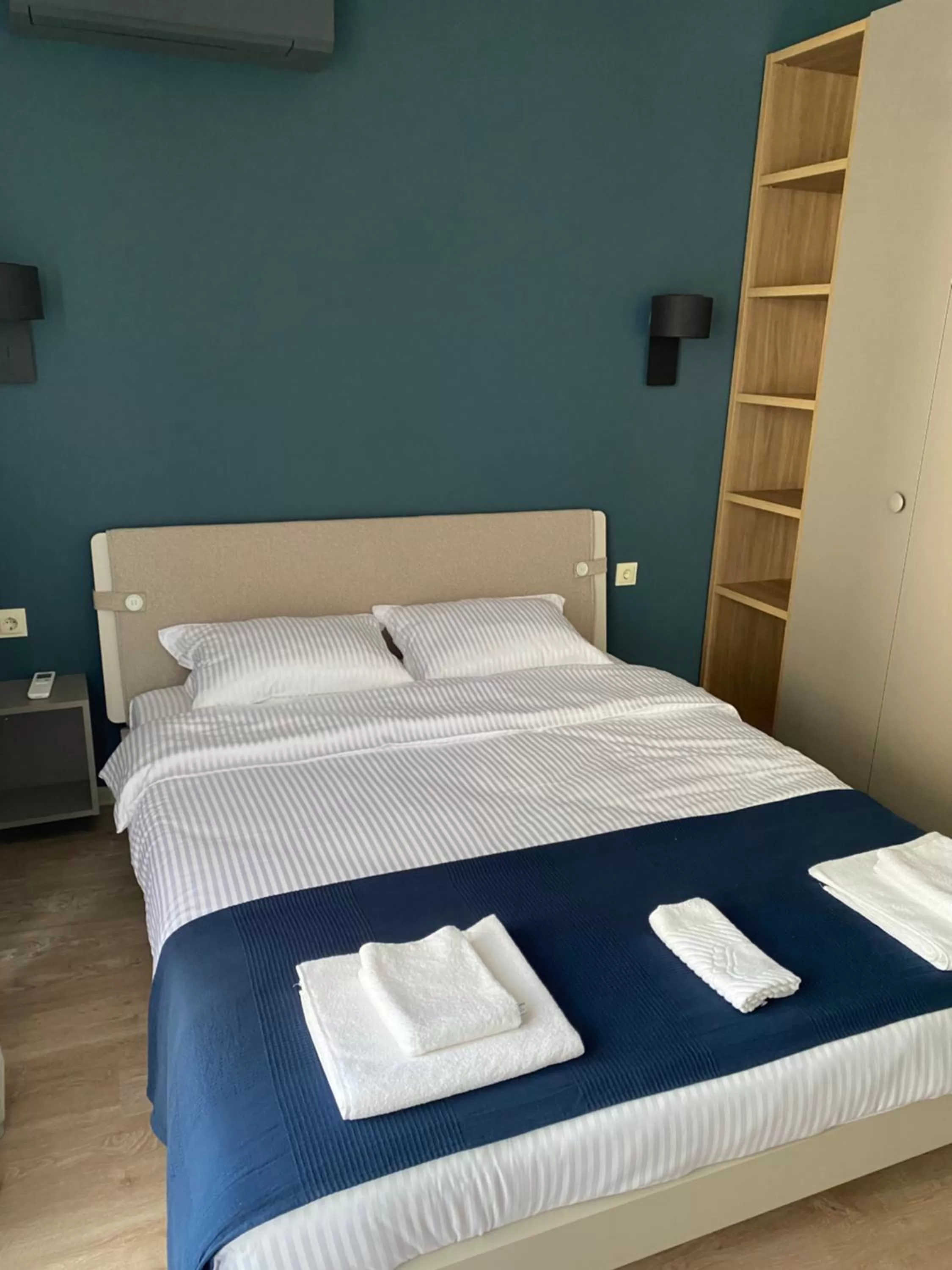 Bed in 7th Sense boutique apartments