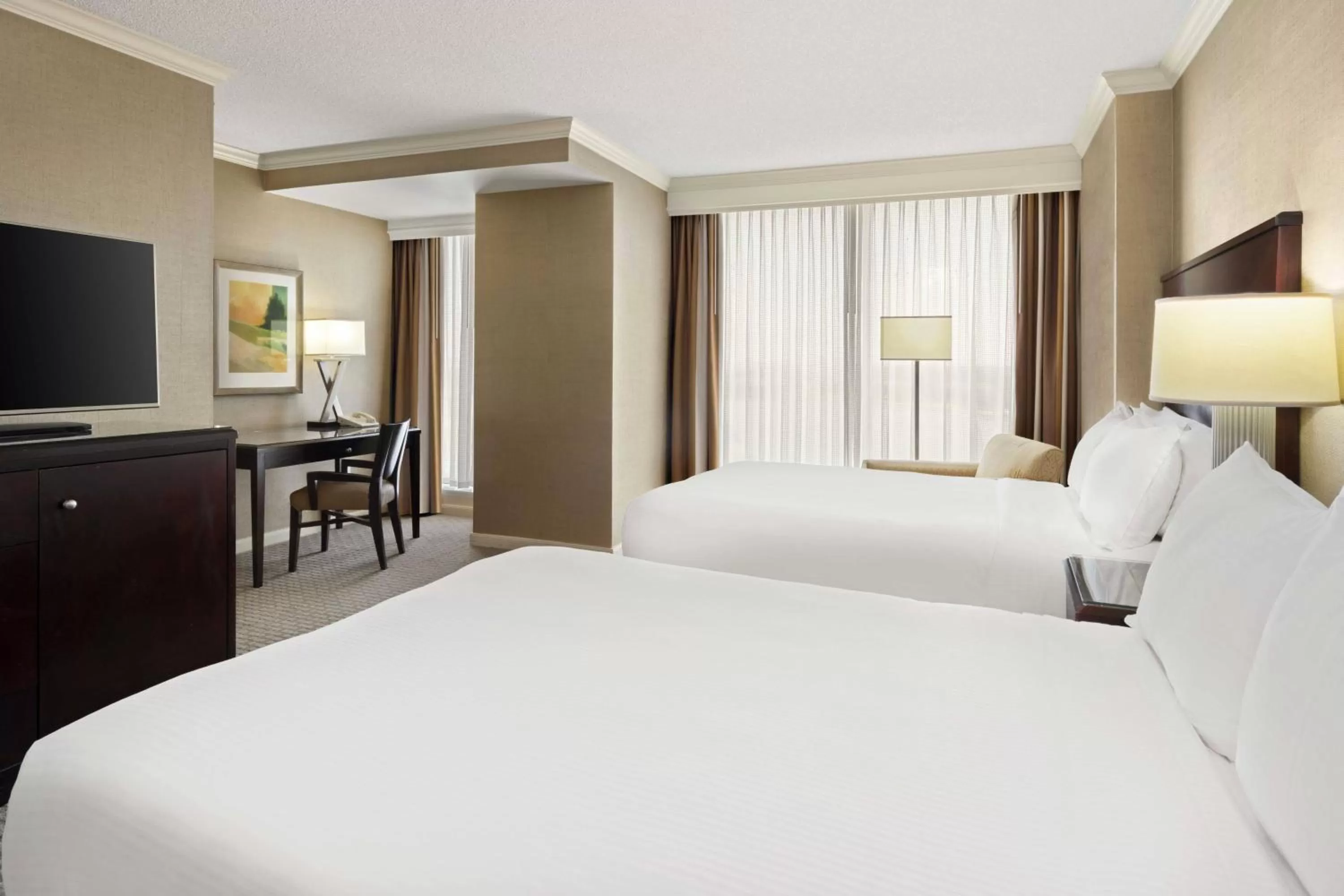 Toilet, Bed in Renaissance Dallas North Hotel