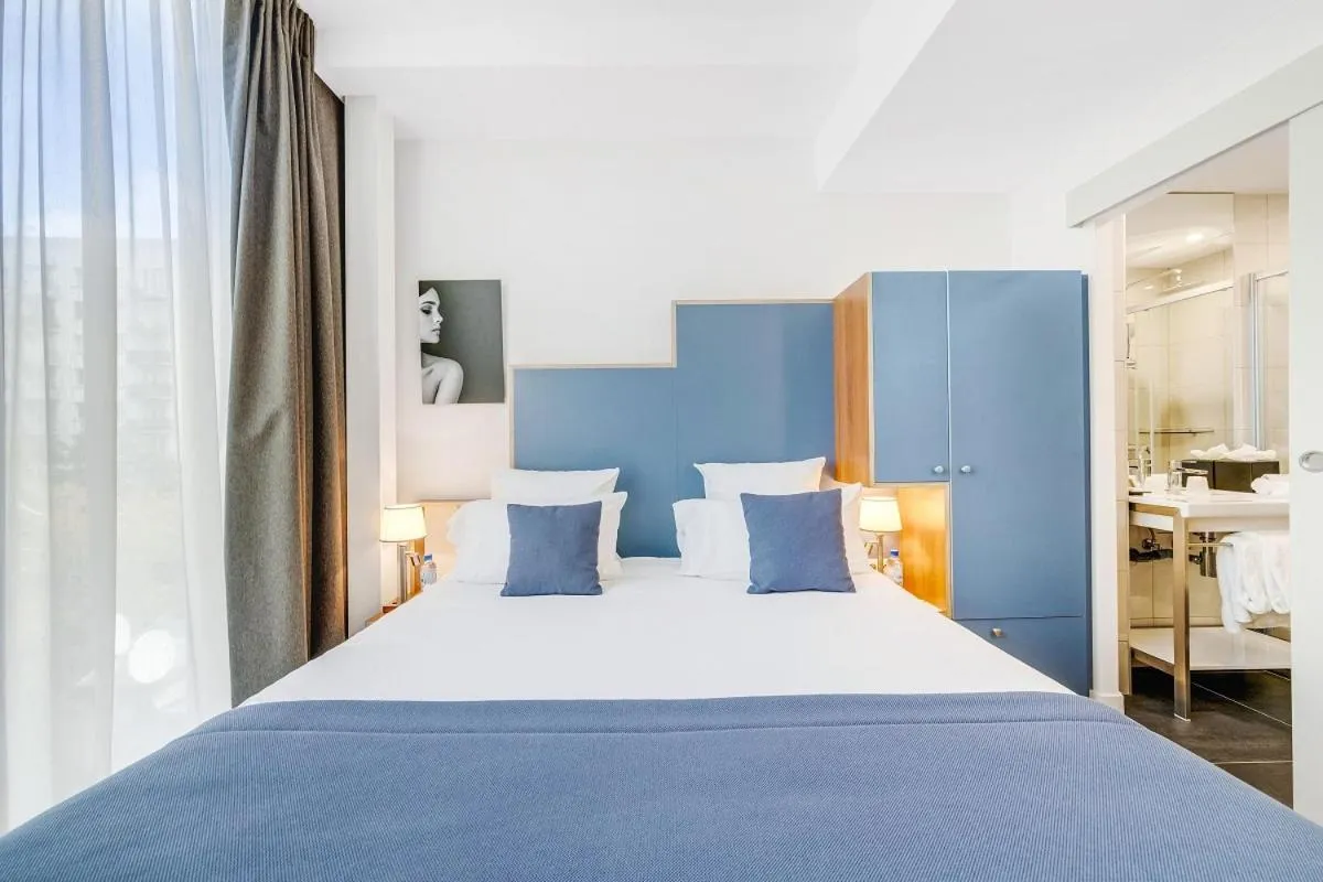 Bed in Hôtel Villa Eiffel Mademoiselle