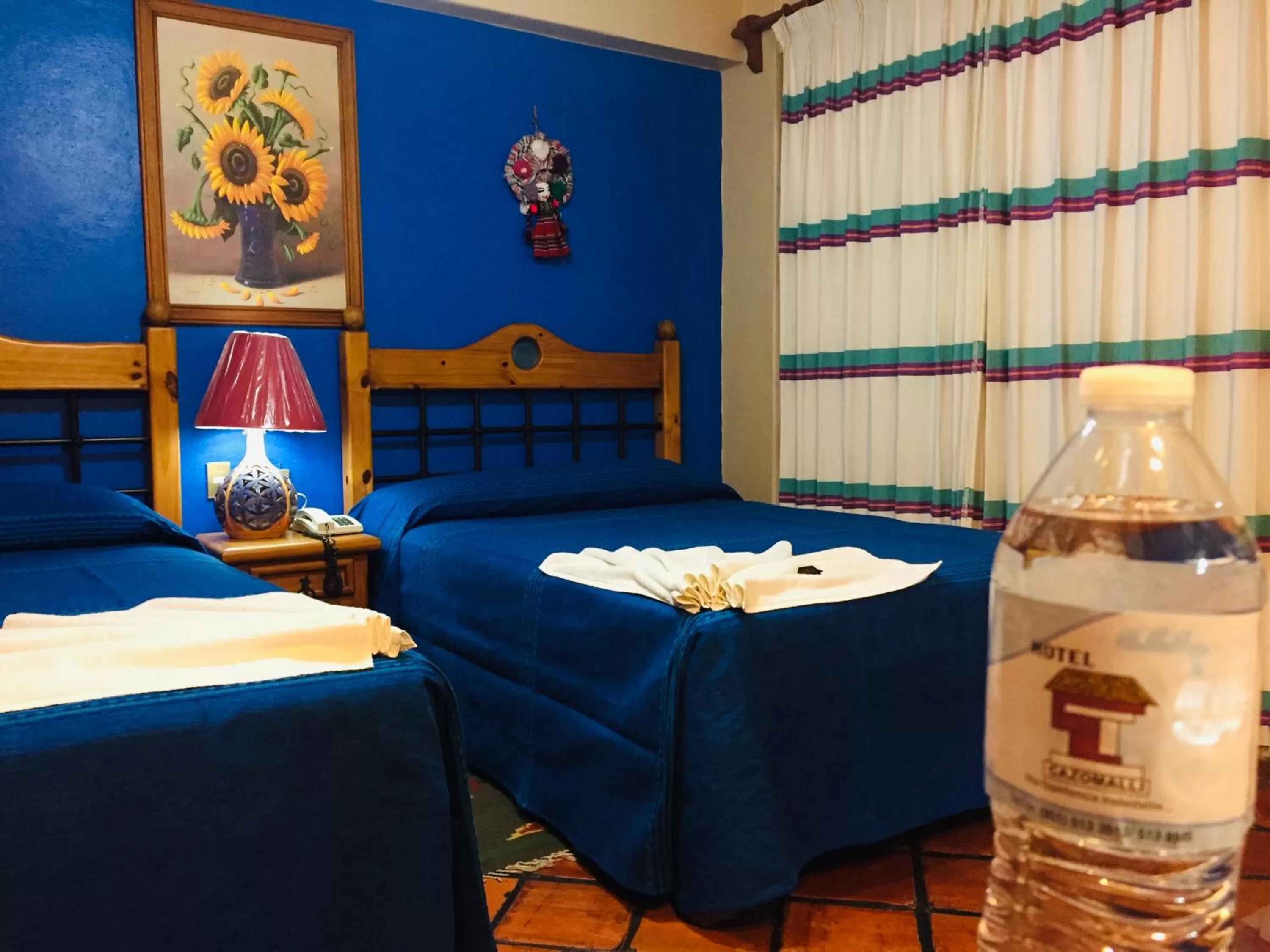 Bed in Hotel Cazomalli Oaxaca