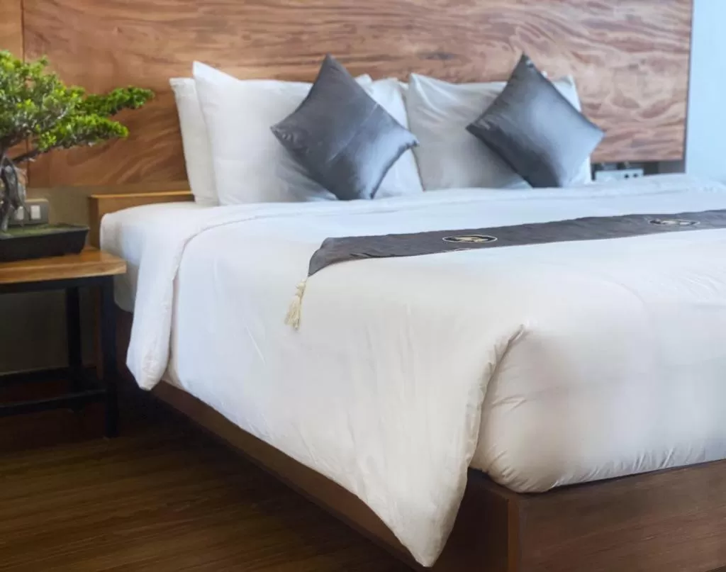 Bed in Lanna Tree Boutique Hotel