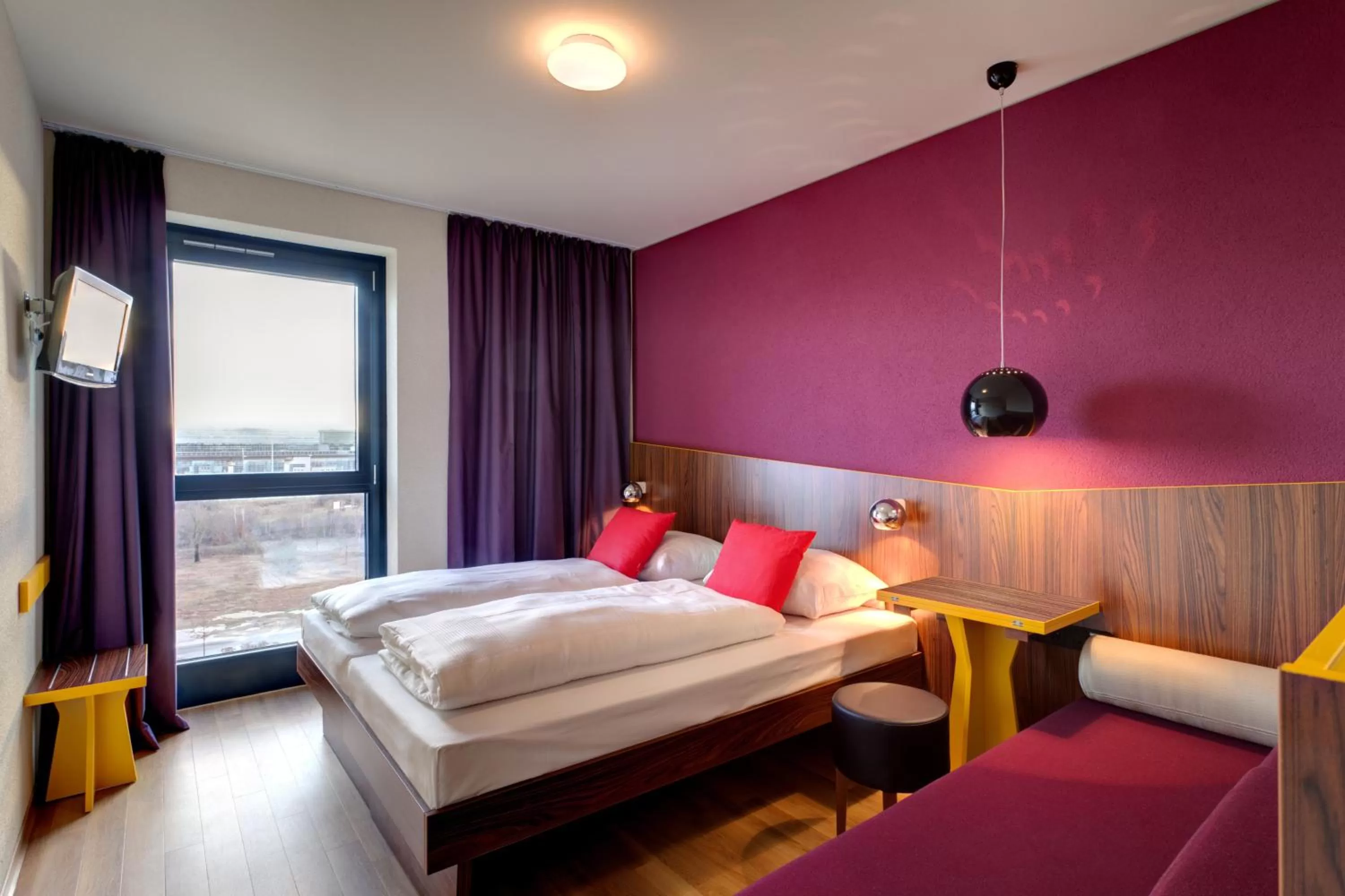 Photo of the whole room, Bed in MEININGER Hotel Frankfurt Main / Airport