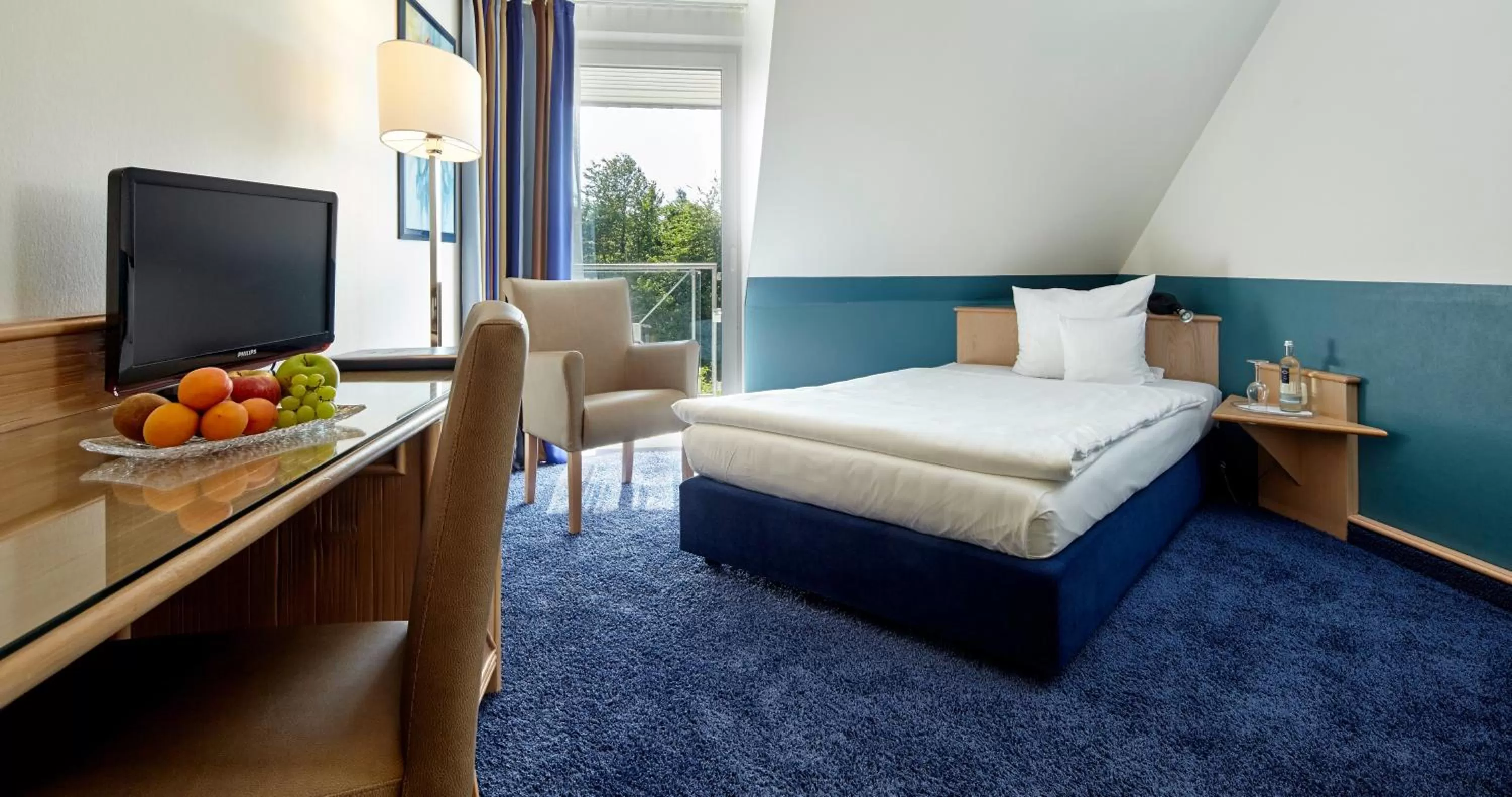 Photo of the whole room, Bed in Parkhotel Weiskirchen