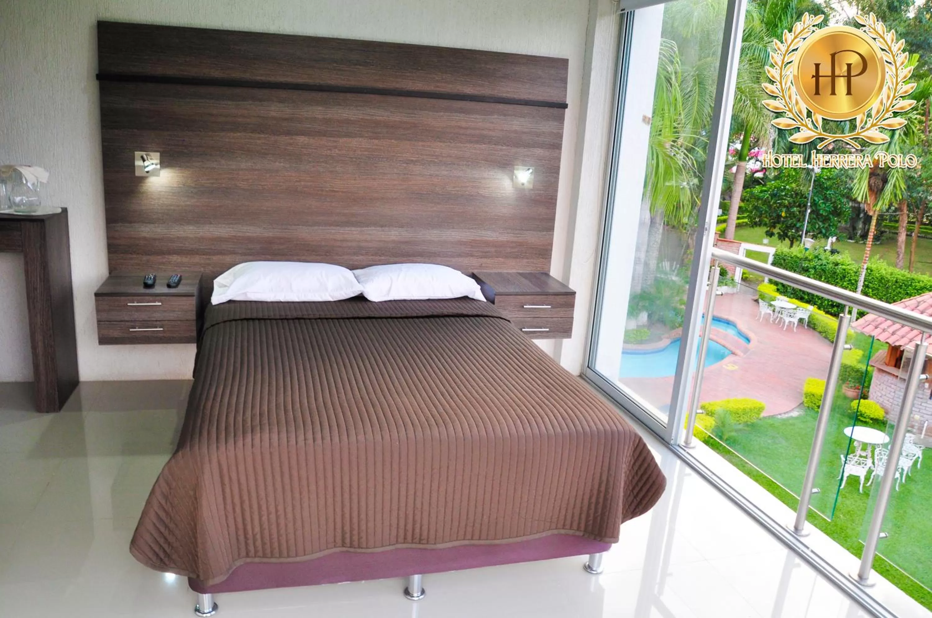 Balcony/Terrace, Bed in Hotel Herrera Polo