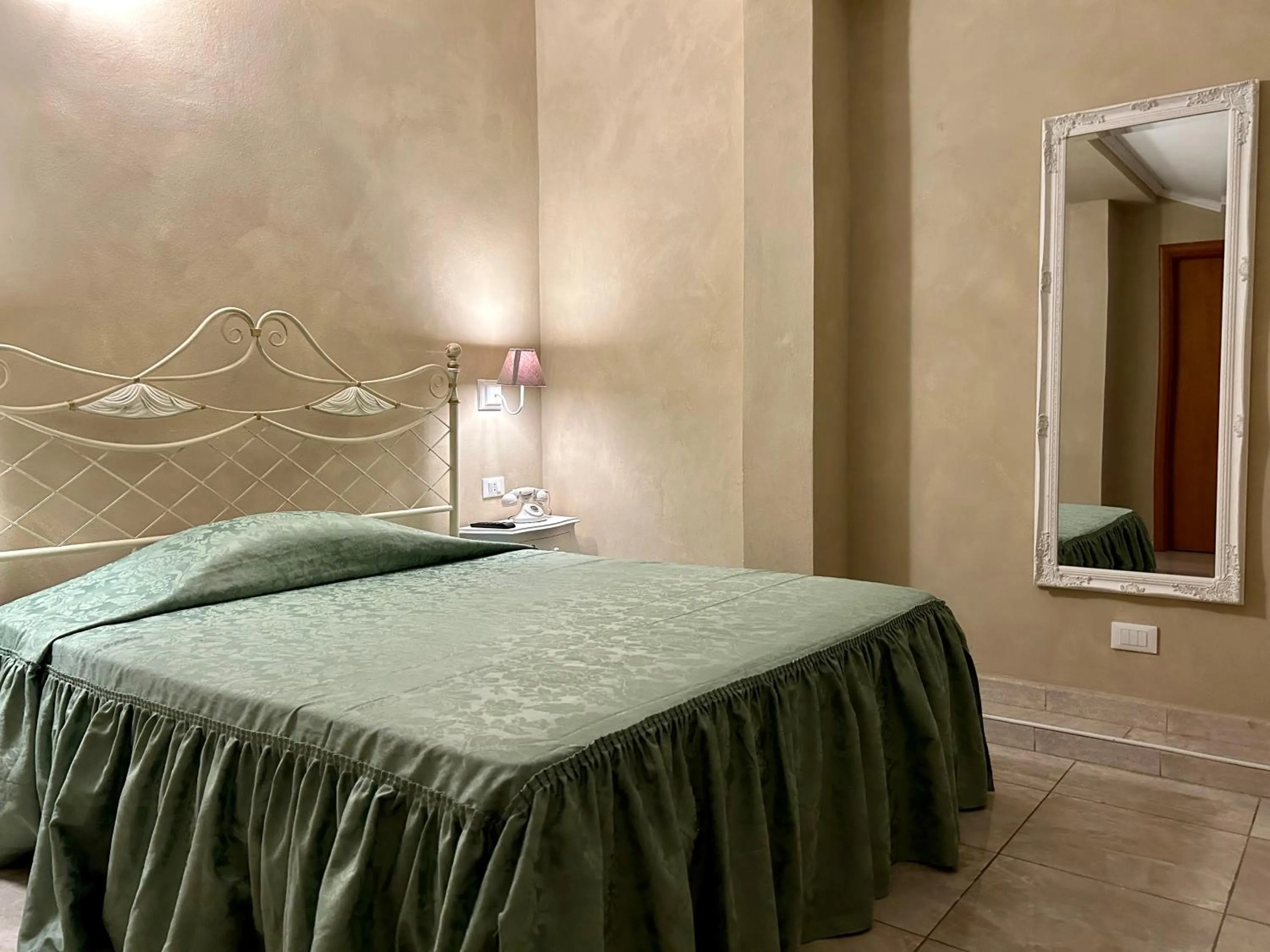 Bed in Boutique Hotel Calais Milano