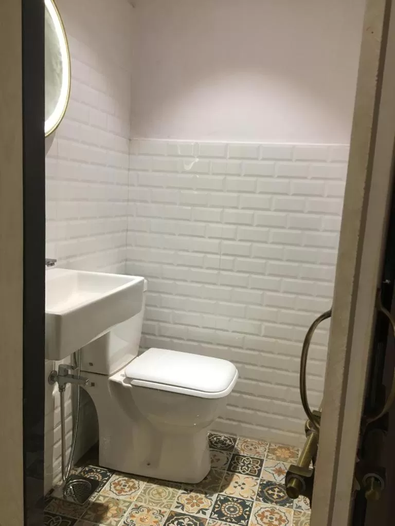 Toilet, Bathroom in HALF Hotel, Calangute