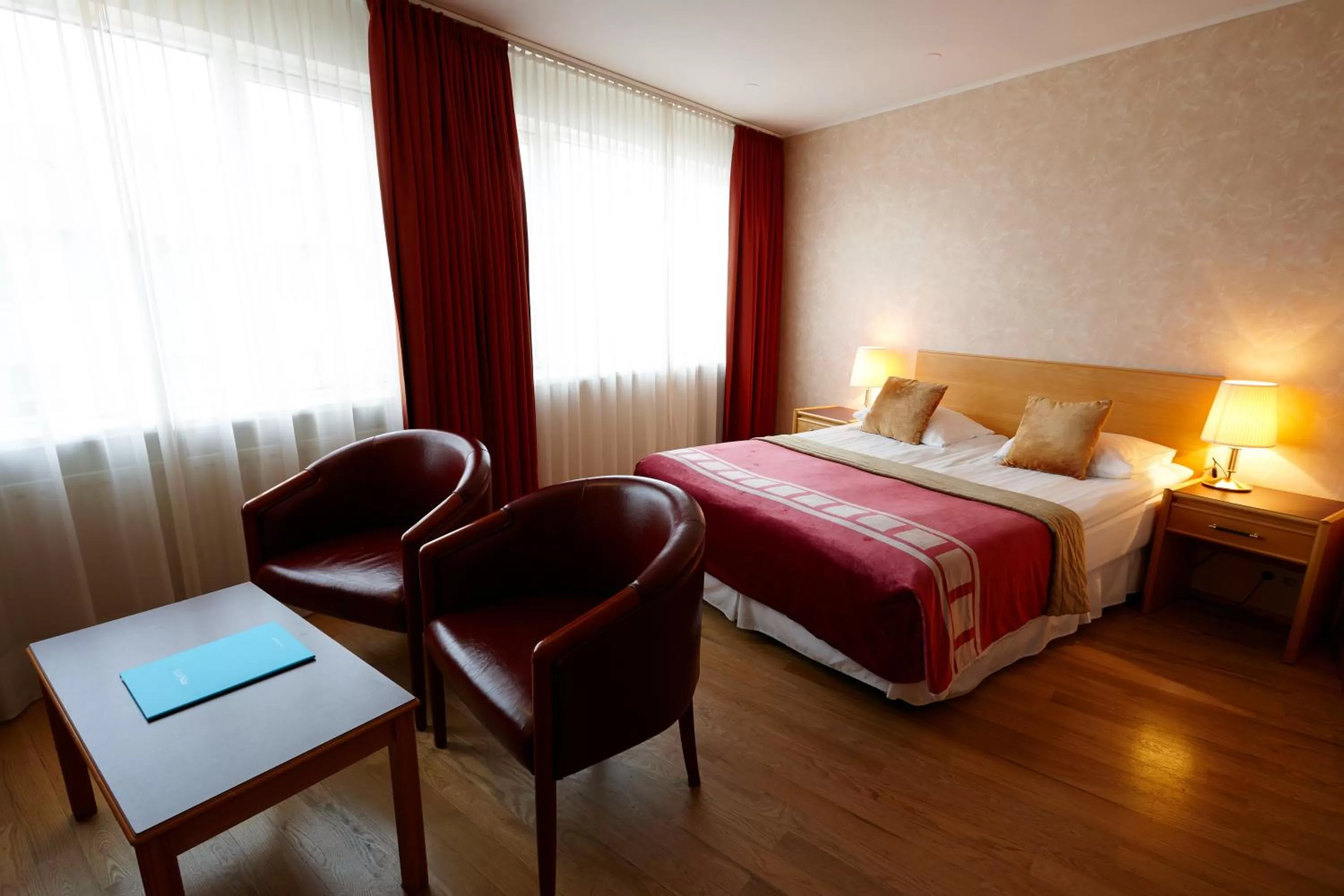 Photo of the whole room, Bed in Fosshotel Rauðará