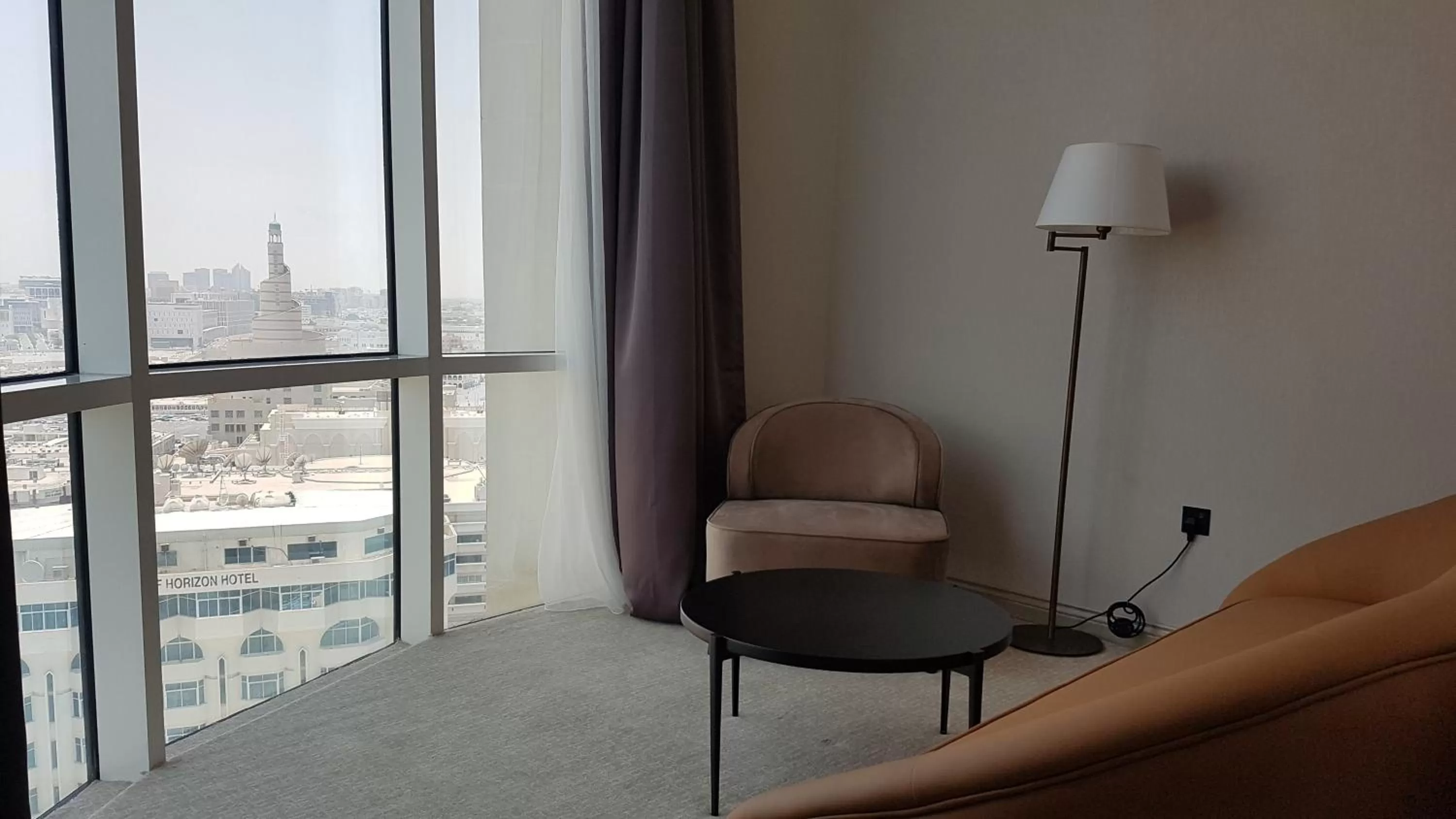 Seating area in Horizon Manor Hotel