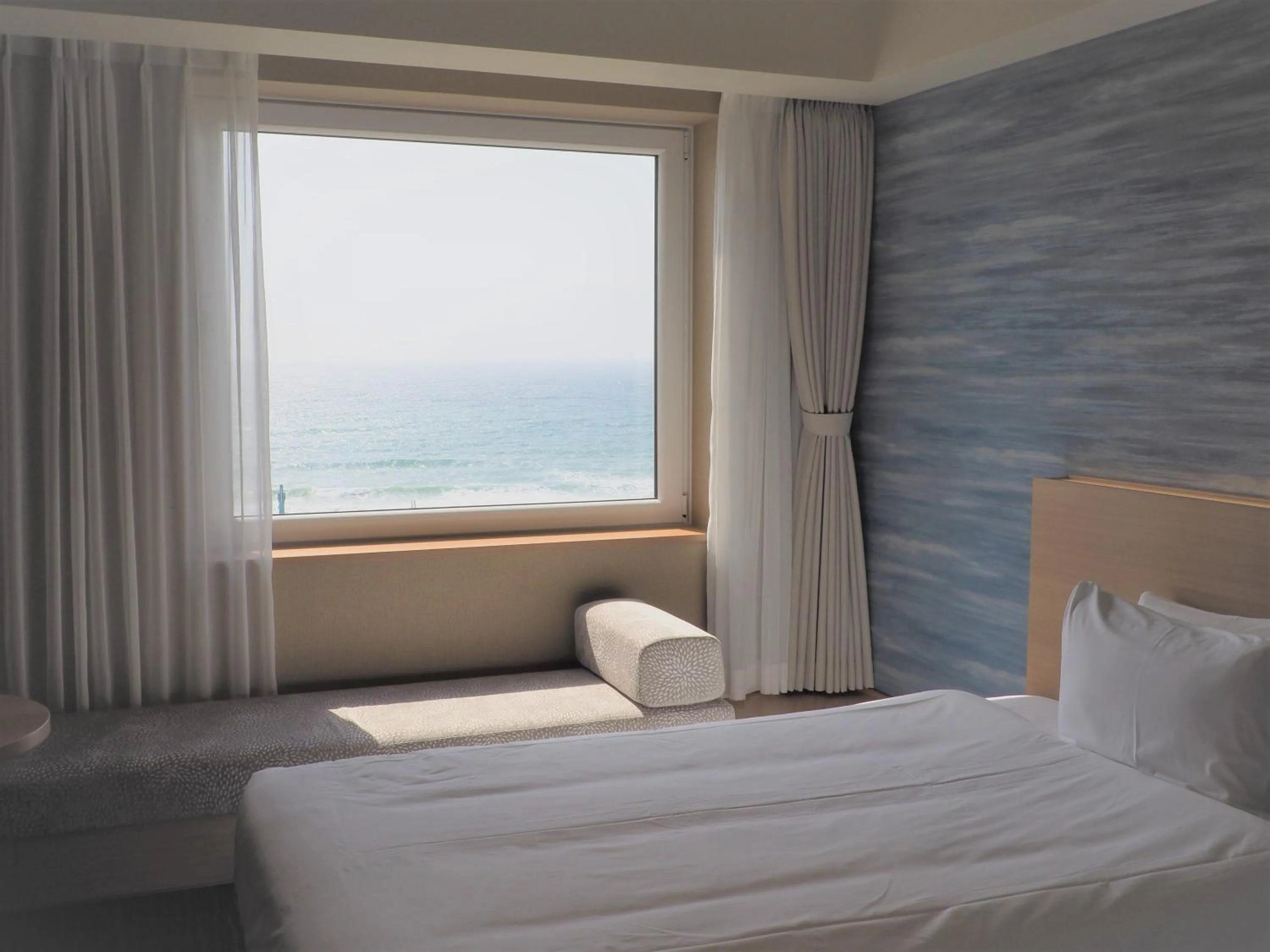 View (from property/room), Bed in Hakodate Yunokawa Onsen Umi to Akari Hewitt Resort