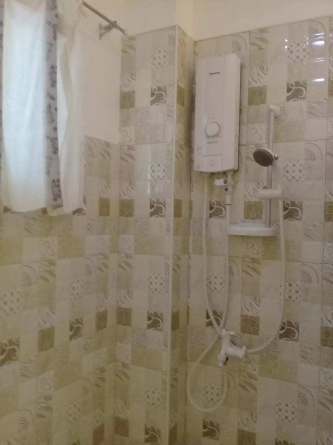 Shower in D & B BLUESTAR BEACH RESORT