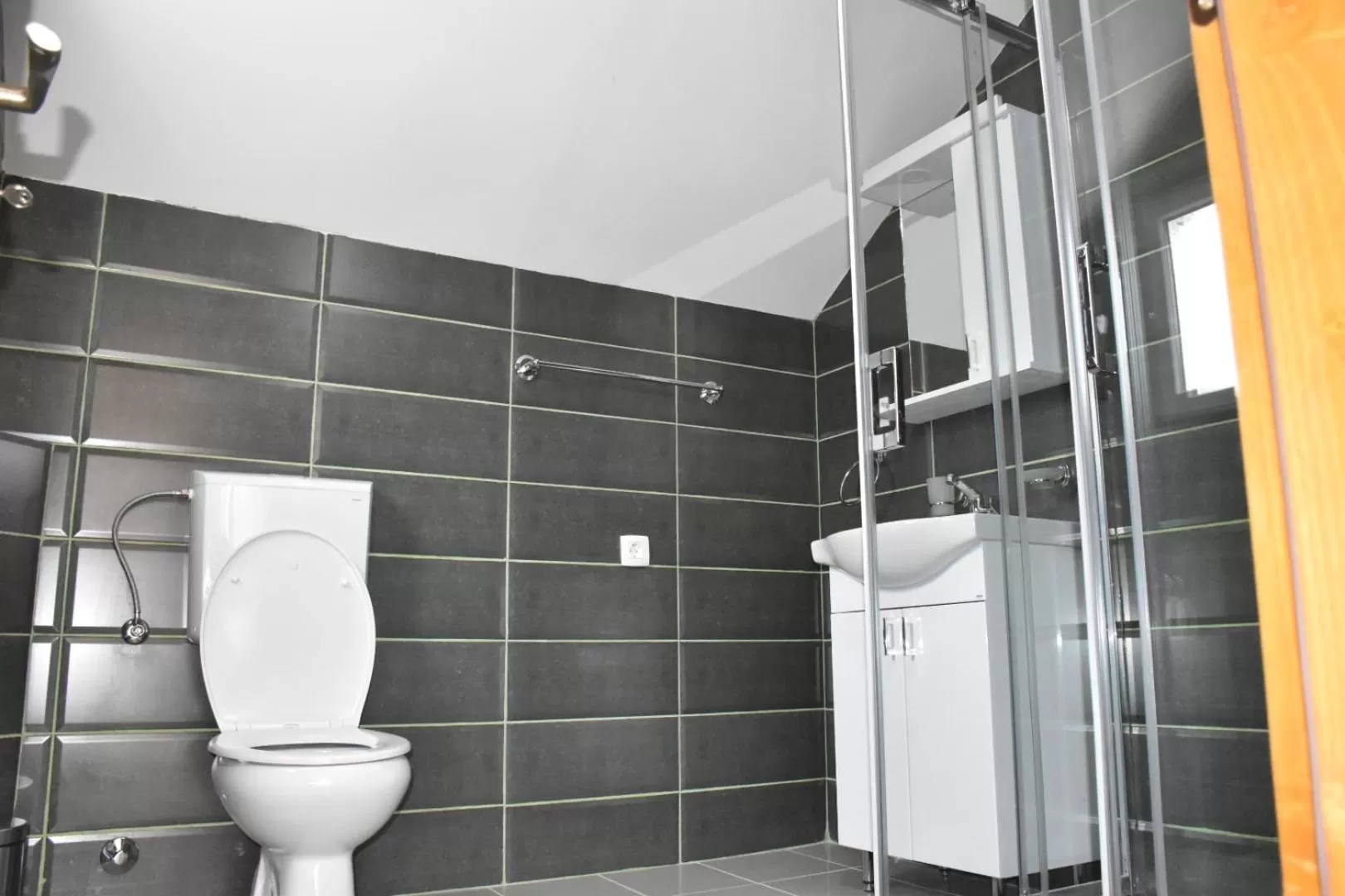 Bathroom in OSTROG Aparthotel KOLIBA-VLASTNIŠTVO MANASTIRA OSTROG