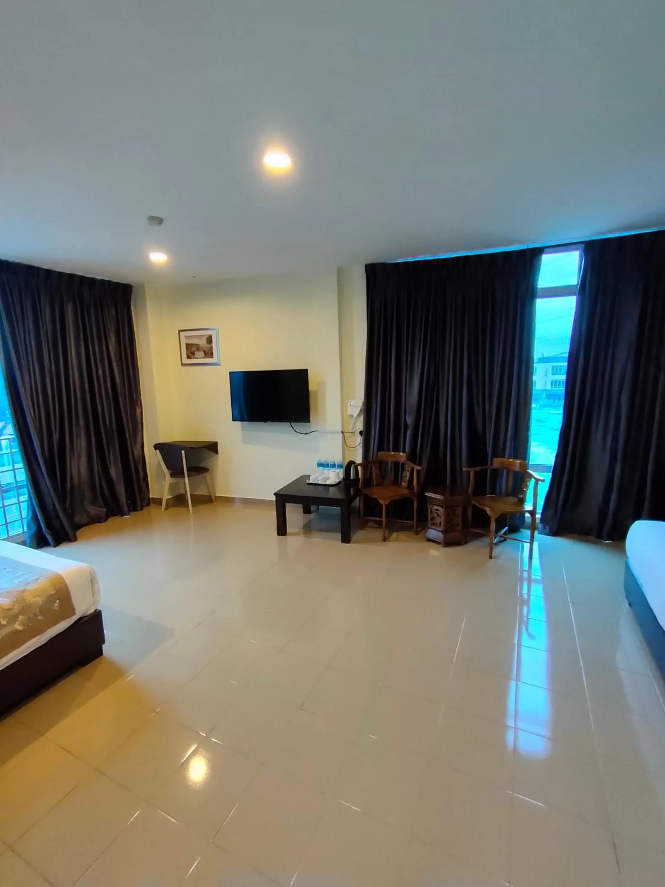 Communal lounge/ TV room in TIONG HUA HOTEL