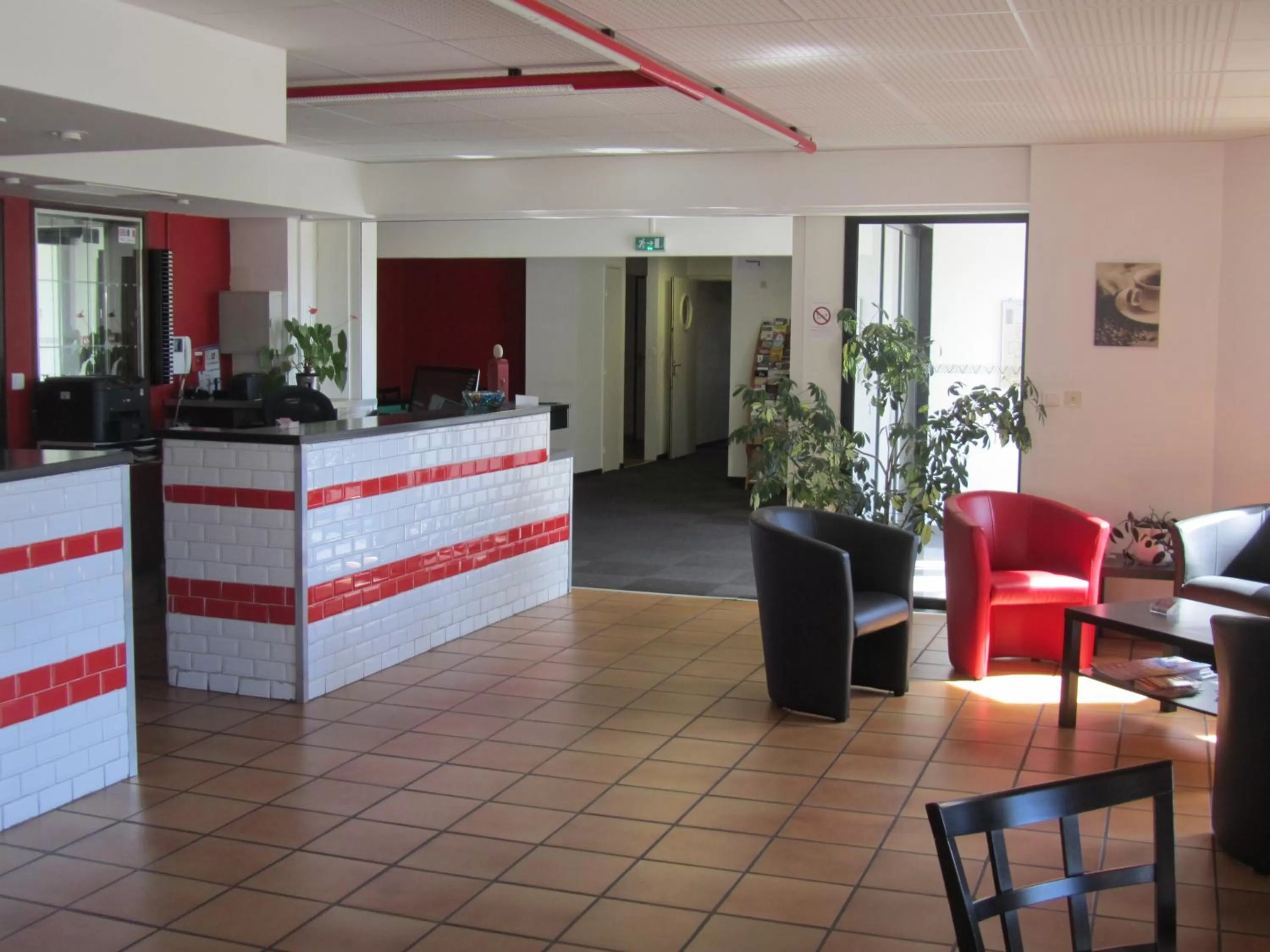 Lobby or reception in Hôtel Le Saint Joseph