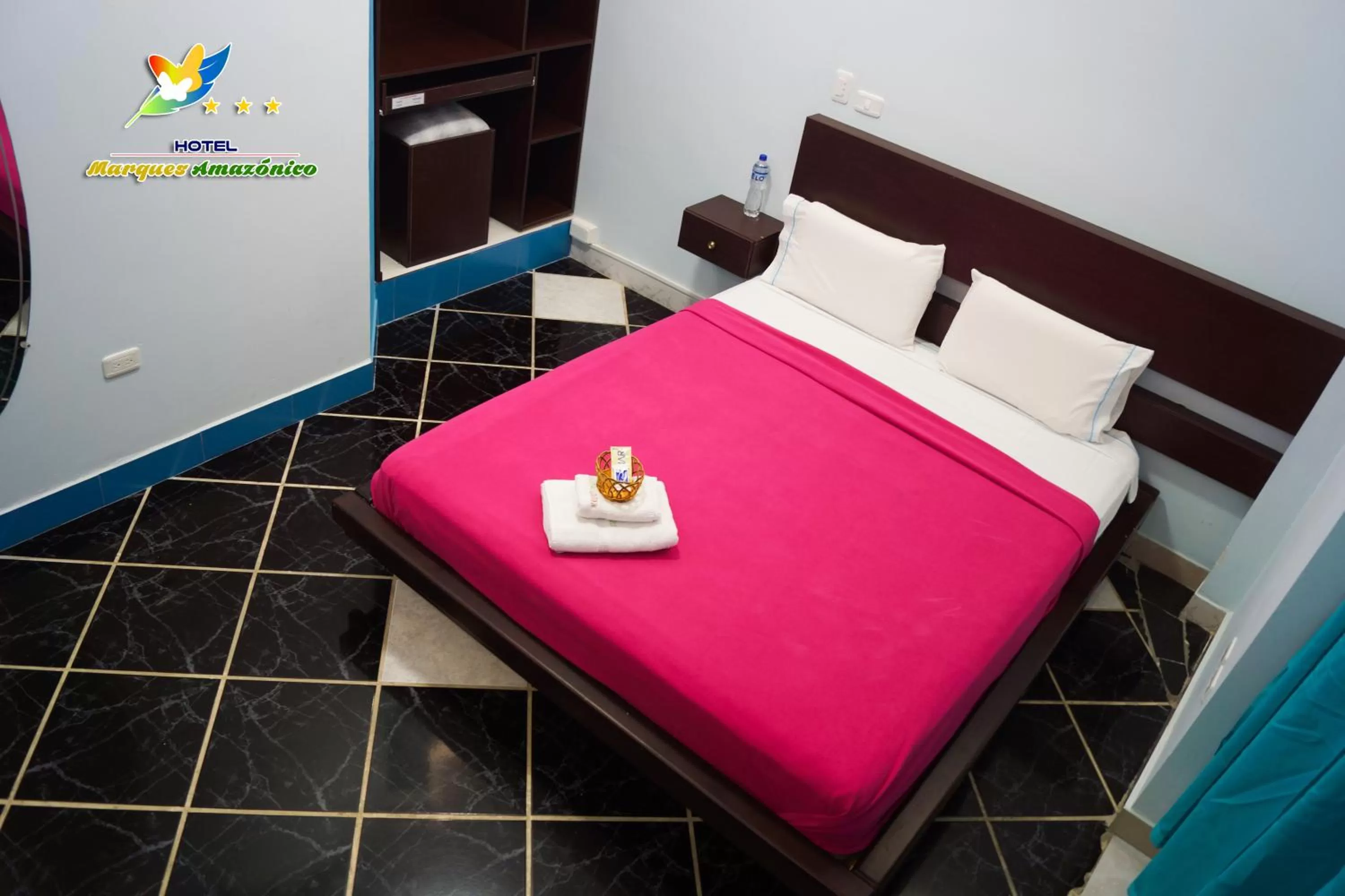 Bed in Hotel Marques Amazonico