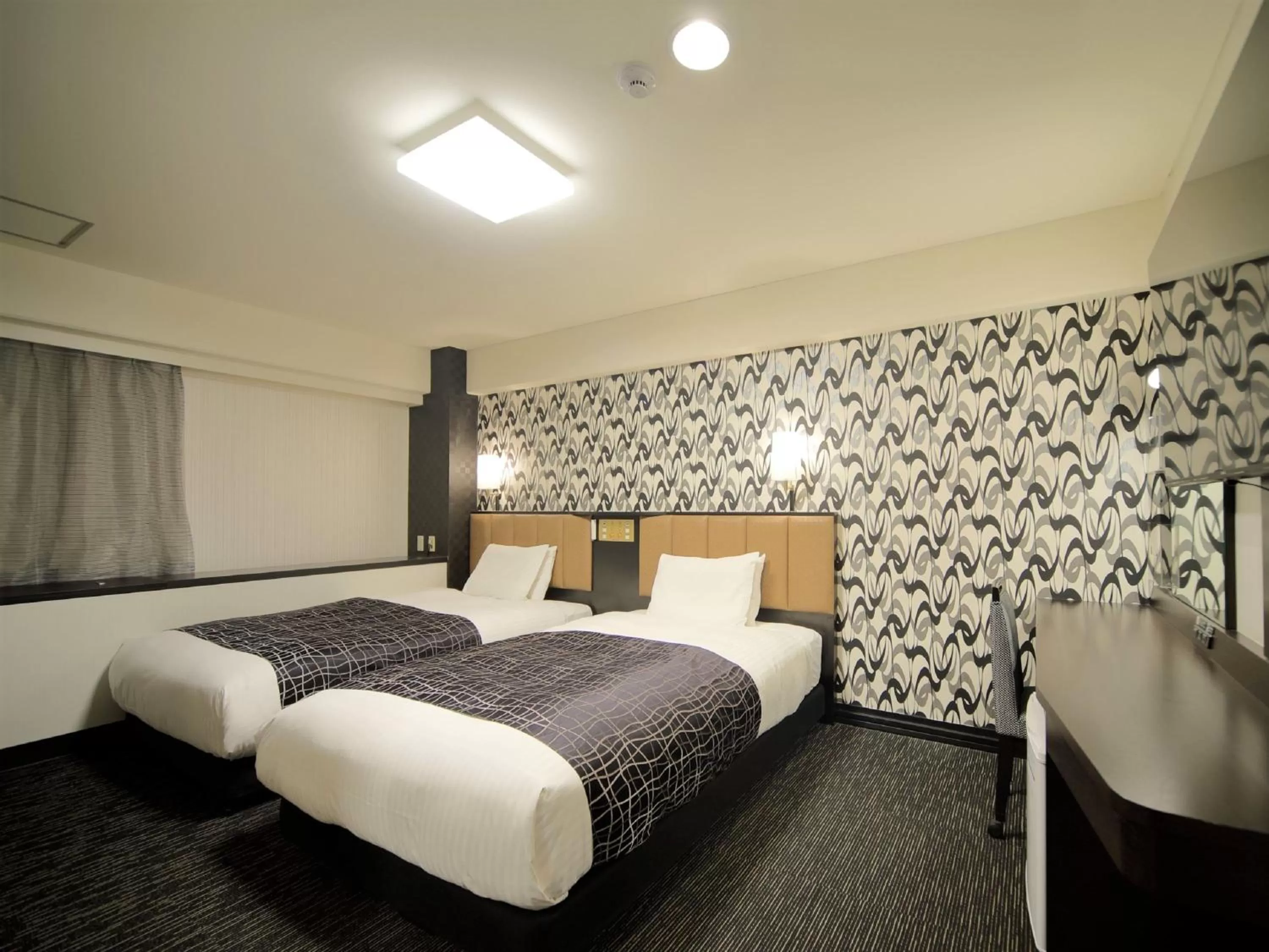 Photo of the whole room, Bed in APA Hotel Kumamoto Sakuramachi Bus Terminal Minami