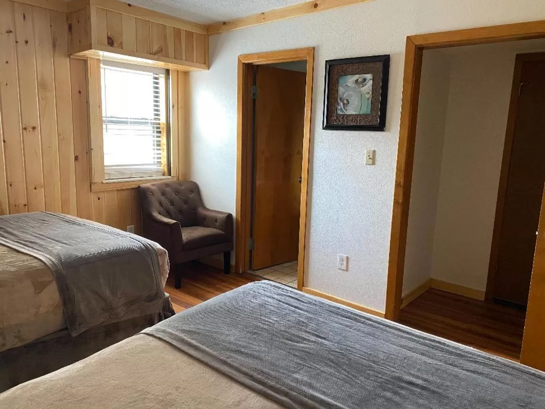 Bed in Zoders Inn and Suites