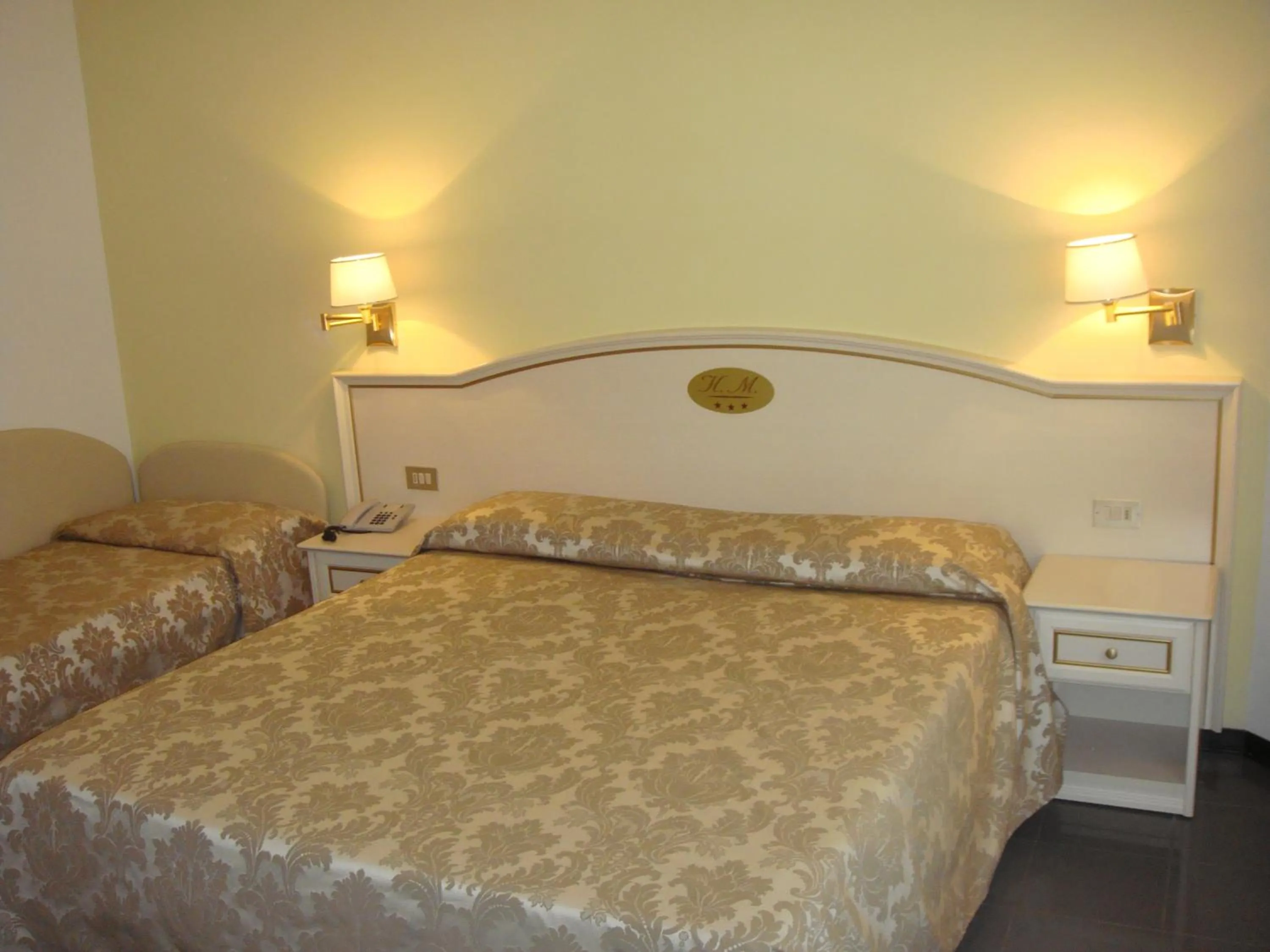 Bed in Hotel La Meridiana