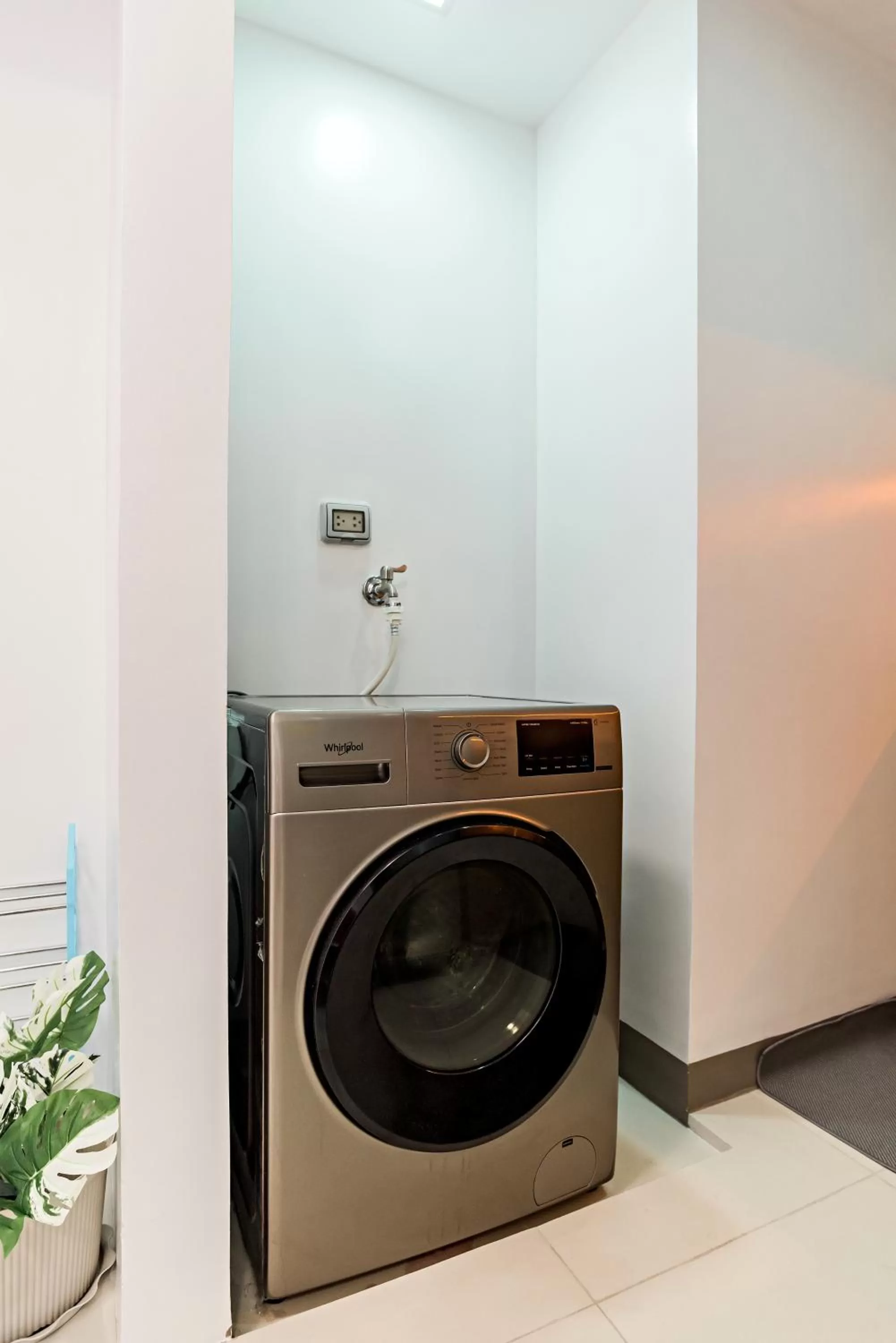 washing machine in 1BR Suite in Uptown BGC