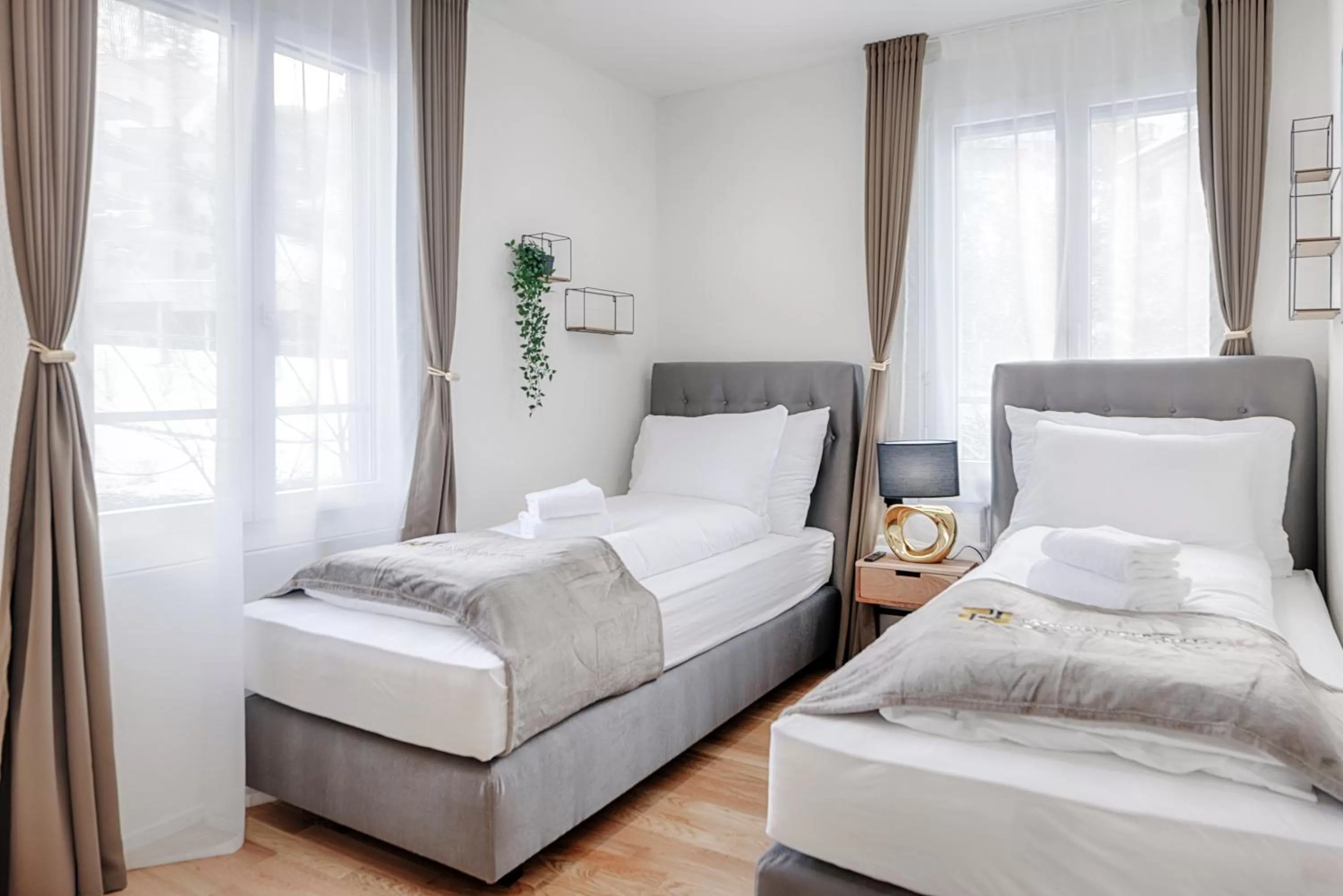 Bed in VISIMO Apartments St Georgen-Strasse St Gallen - Design City Nature