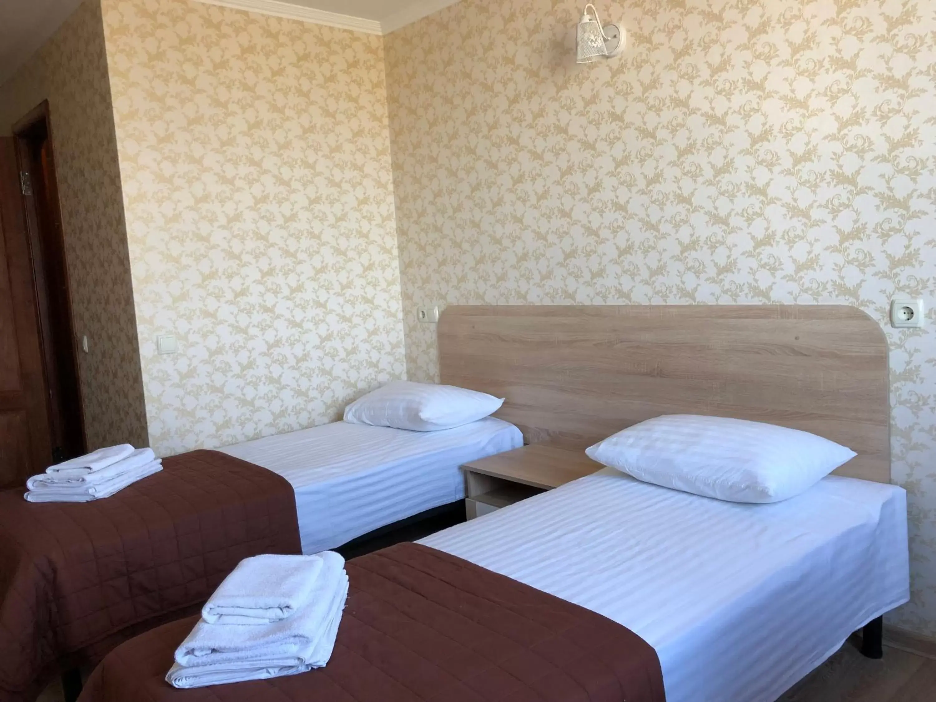 Twin Room in Zhuliany City Hotel Twin Room in Zhuliany City Hotel