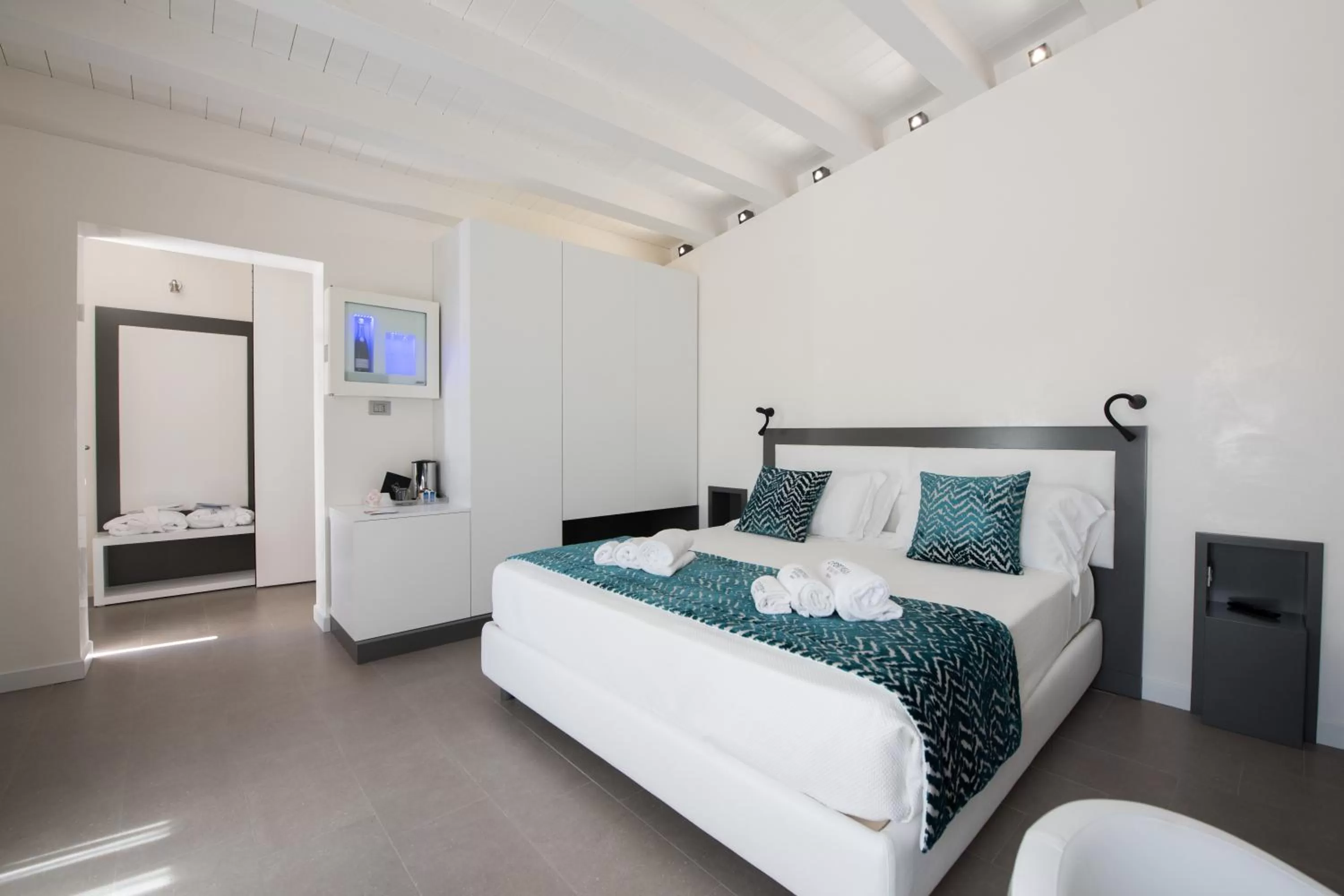 Bedroom in Caportigia Boutique Hotel