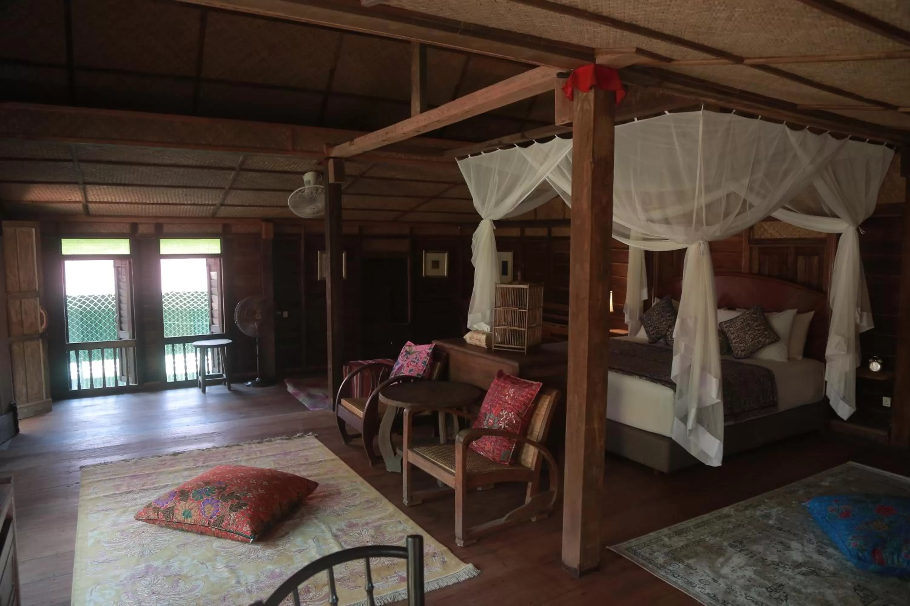 Bed in Kunang Kunang Heritage Villas