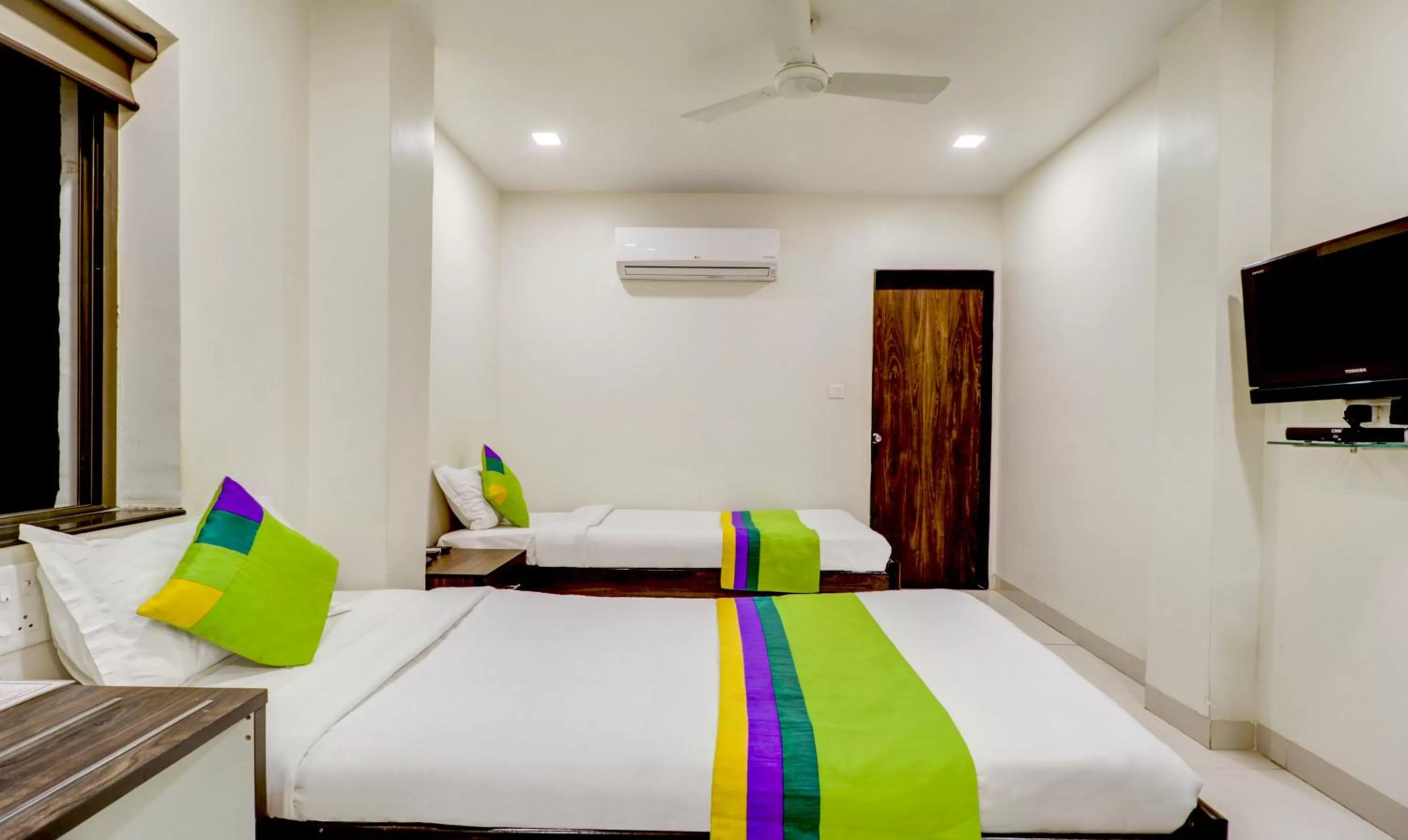 Bed in Treebo Trend Orange City