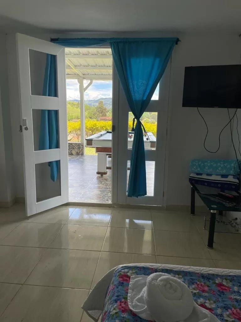 TV/Entertainment Center in Paradise Lake Finca Hotel