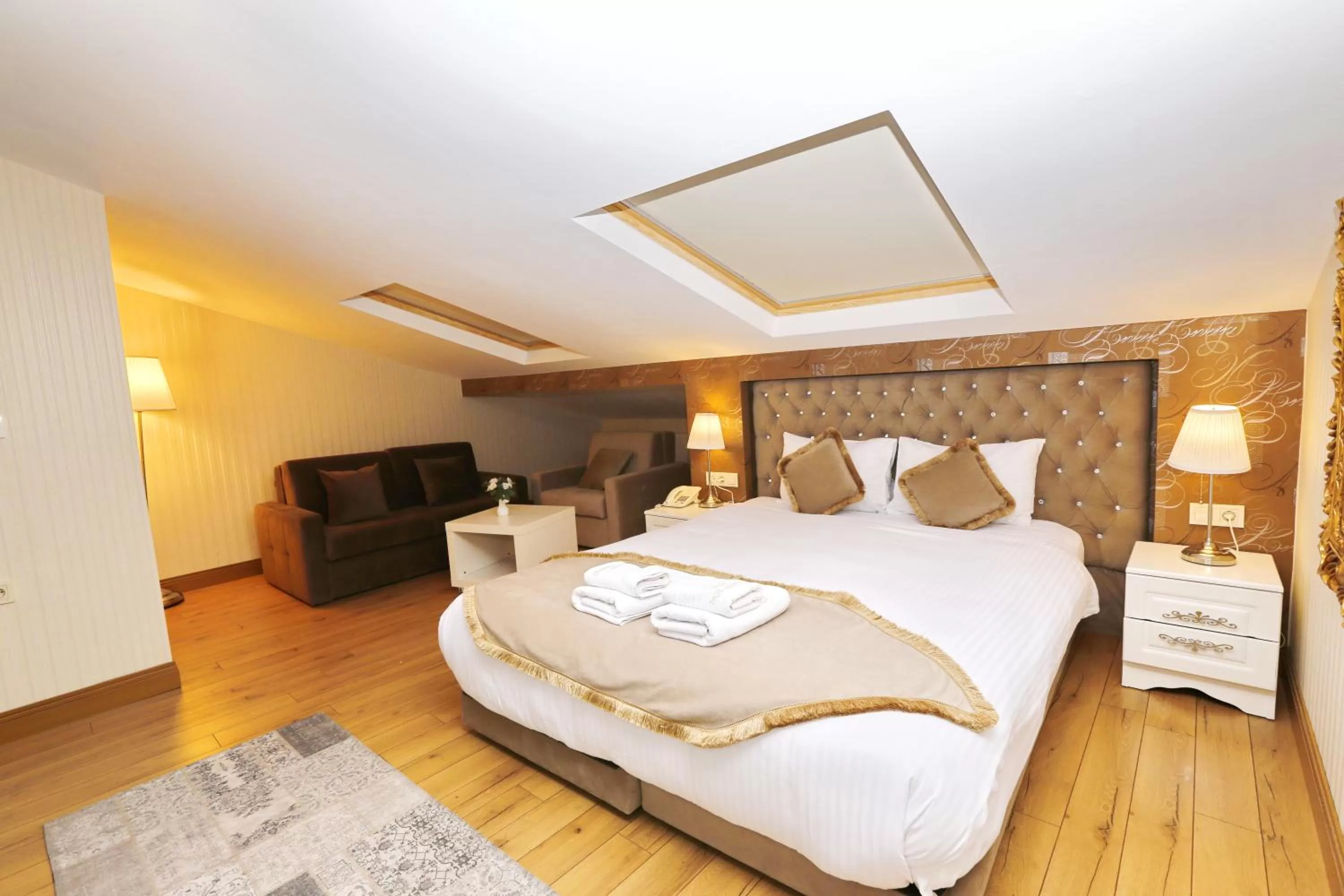 Bed in Diamond Royal Hotel