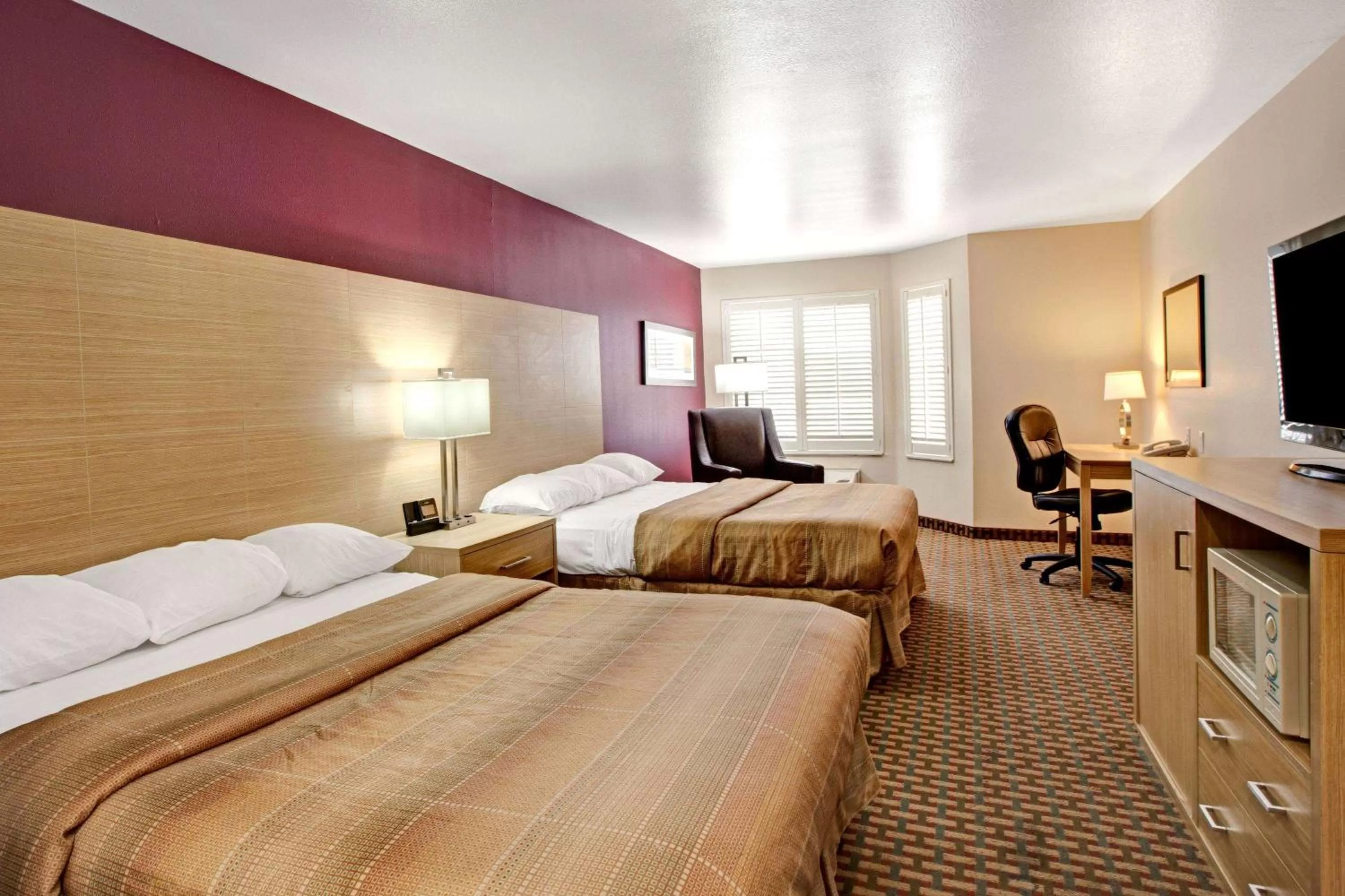 Photo of the whole room, Bed in Ramada Limited and Suites San Francisco Airport