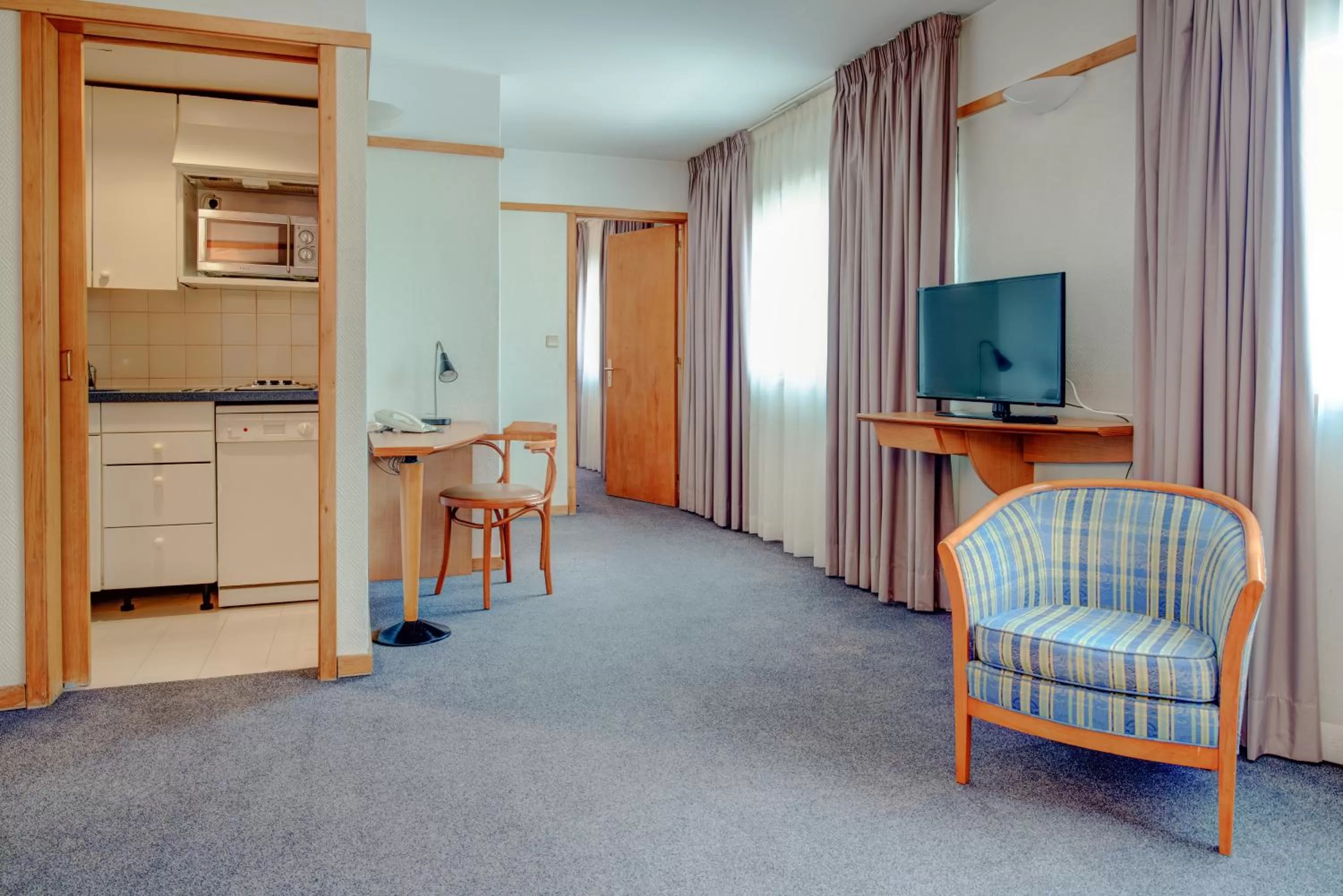 Living room in VIP Executive Eden Aparthotel