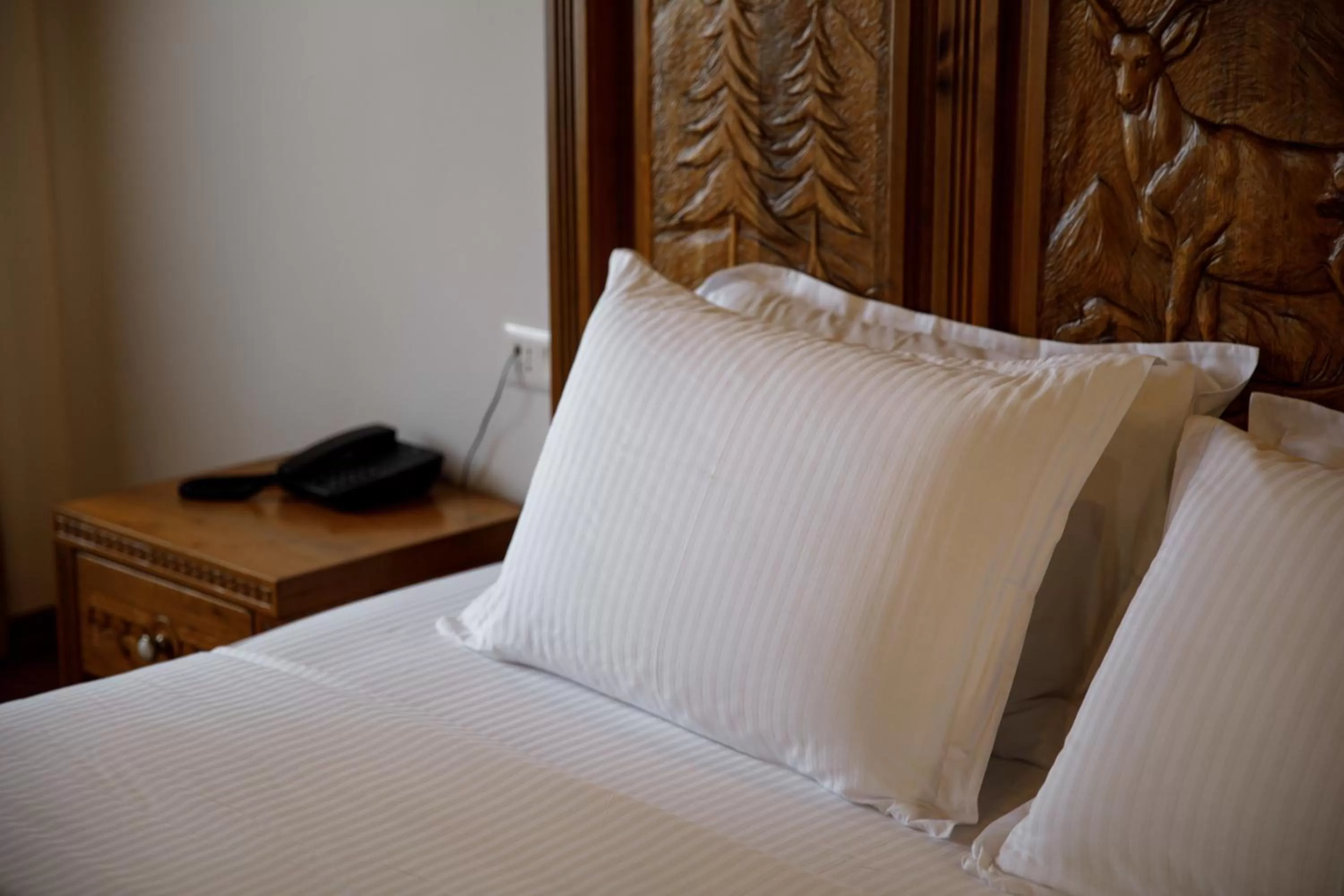 Bed in Rose Garden Hotel