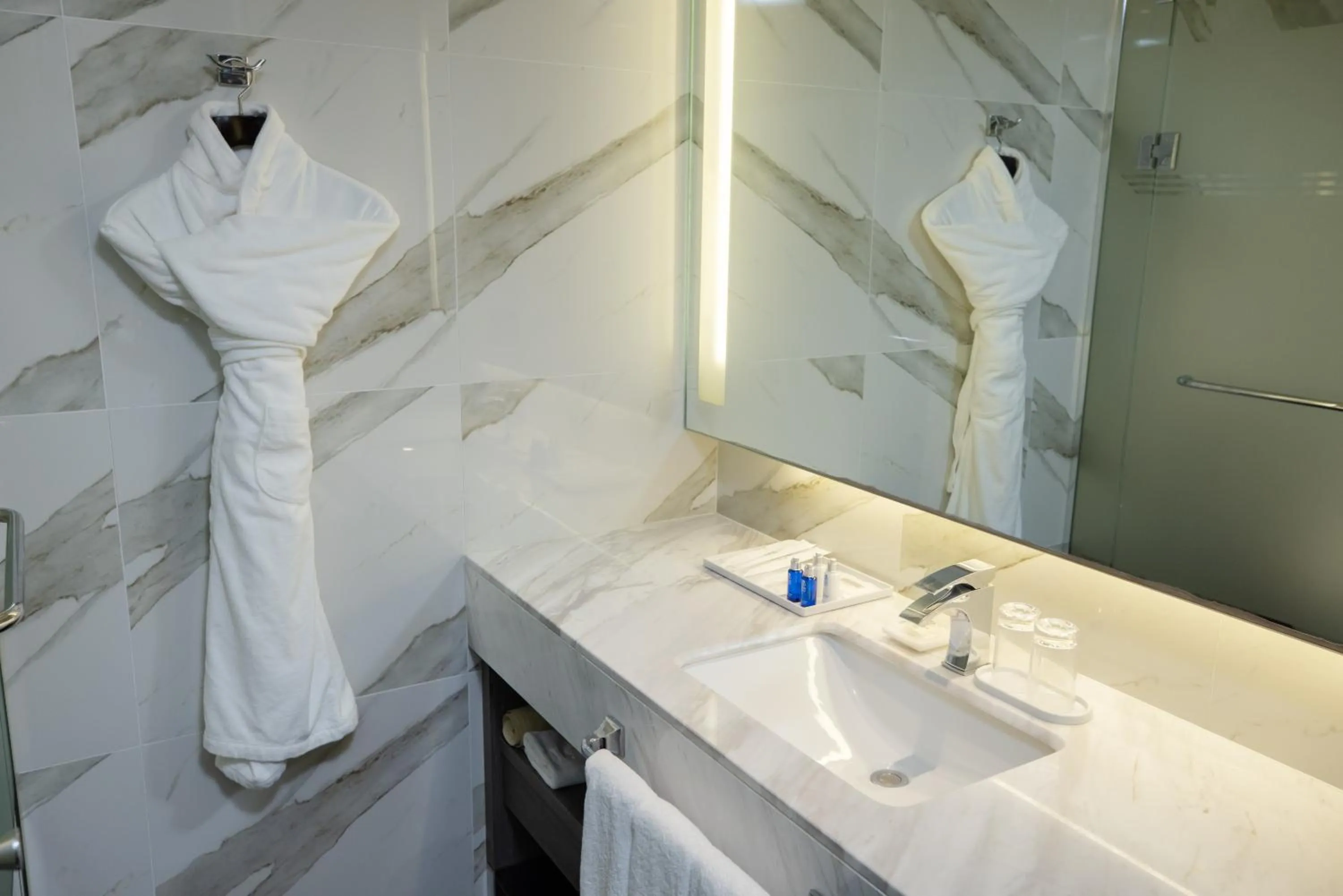 Toilet in Kent Hotel Gwangalli by Kensington