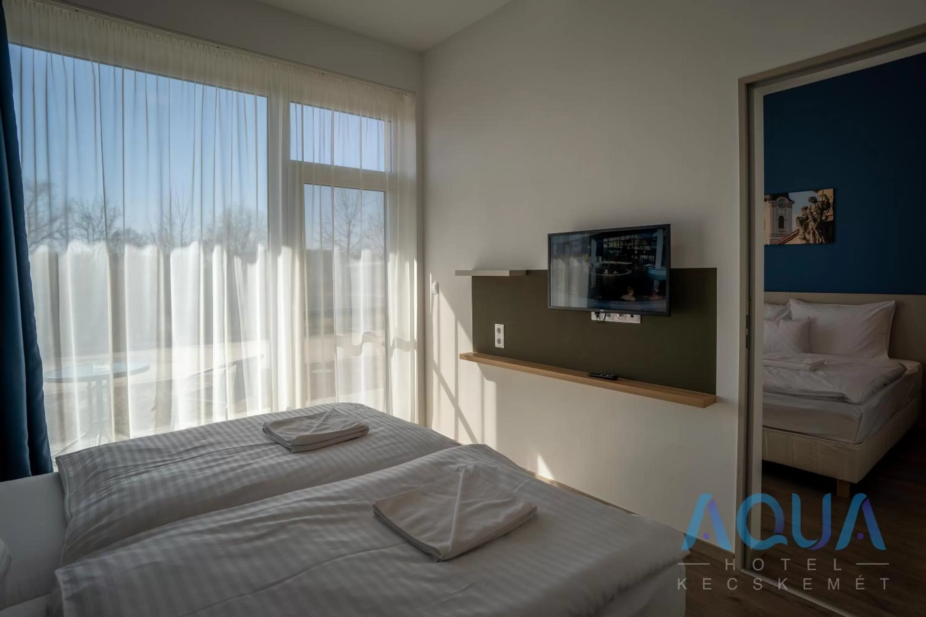 Photo of the whole room, Bed in Aqua Hotel