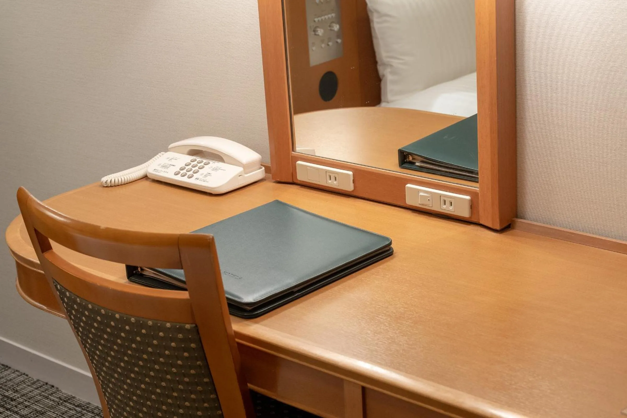 Bedroom in Toshi Center Hotel