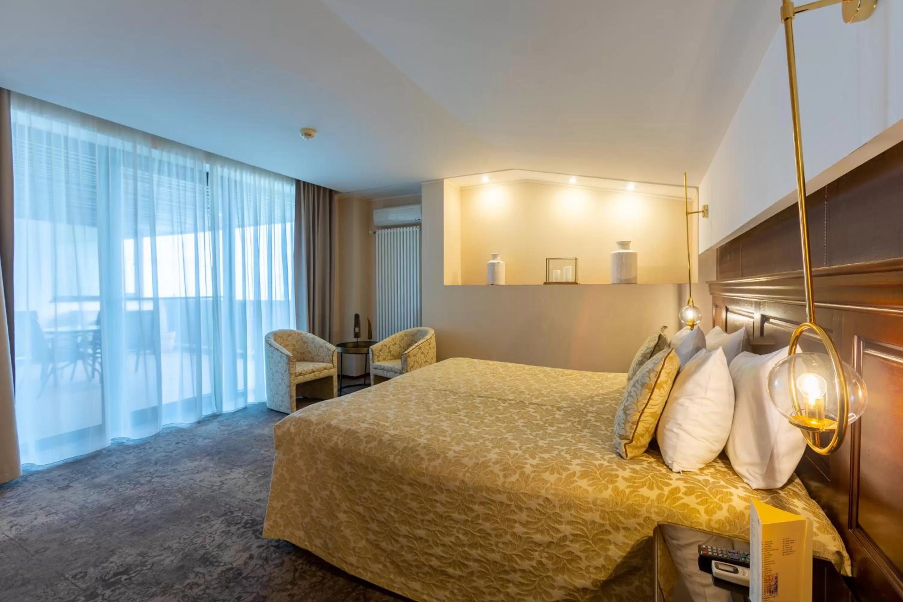 Bed in Alpin Resort Hotel