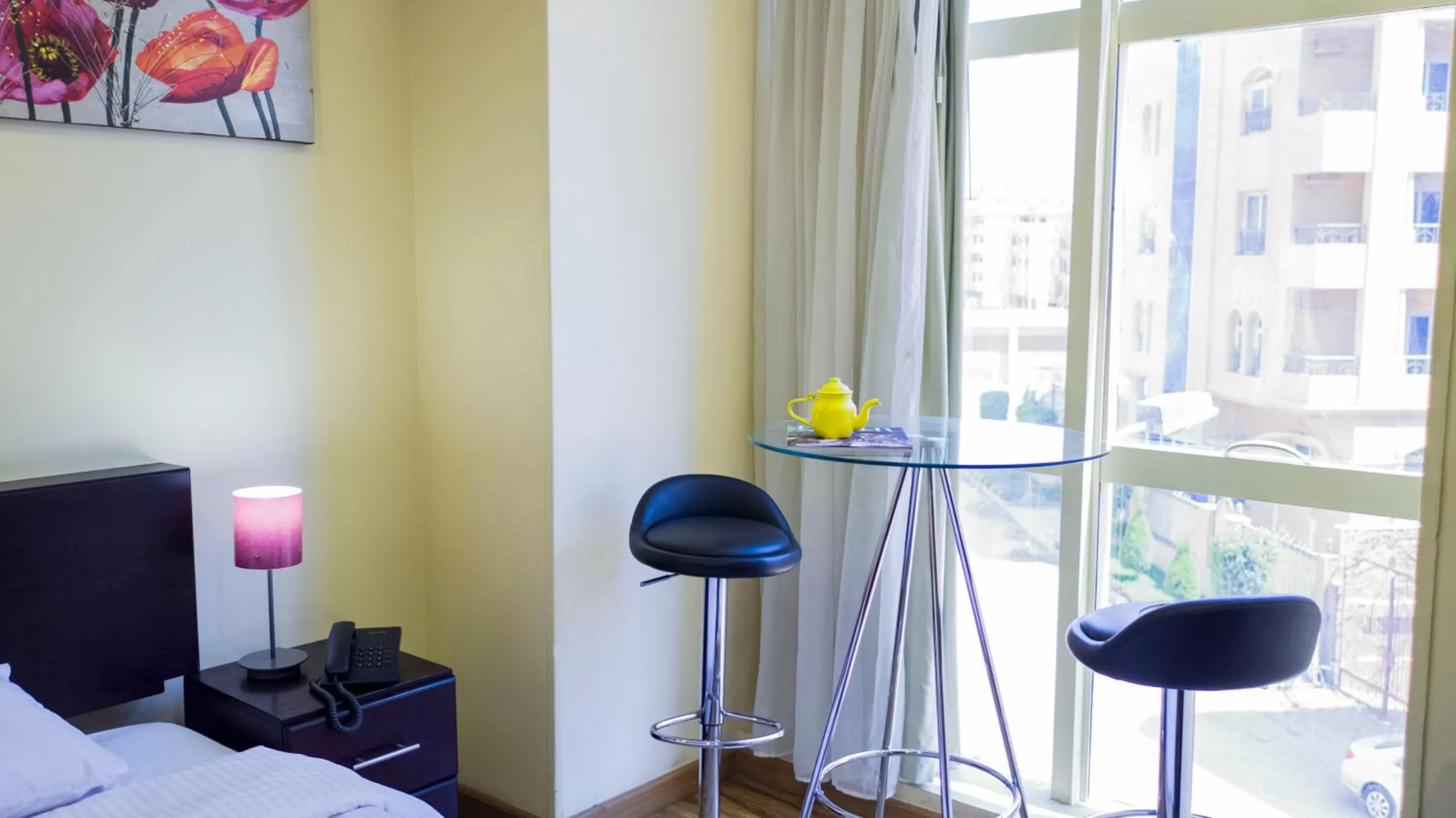 Seating area in NewCity Hotel & Suites