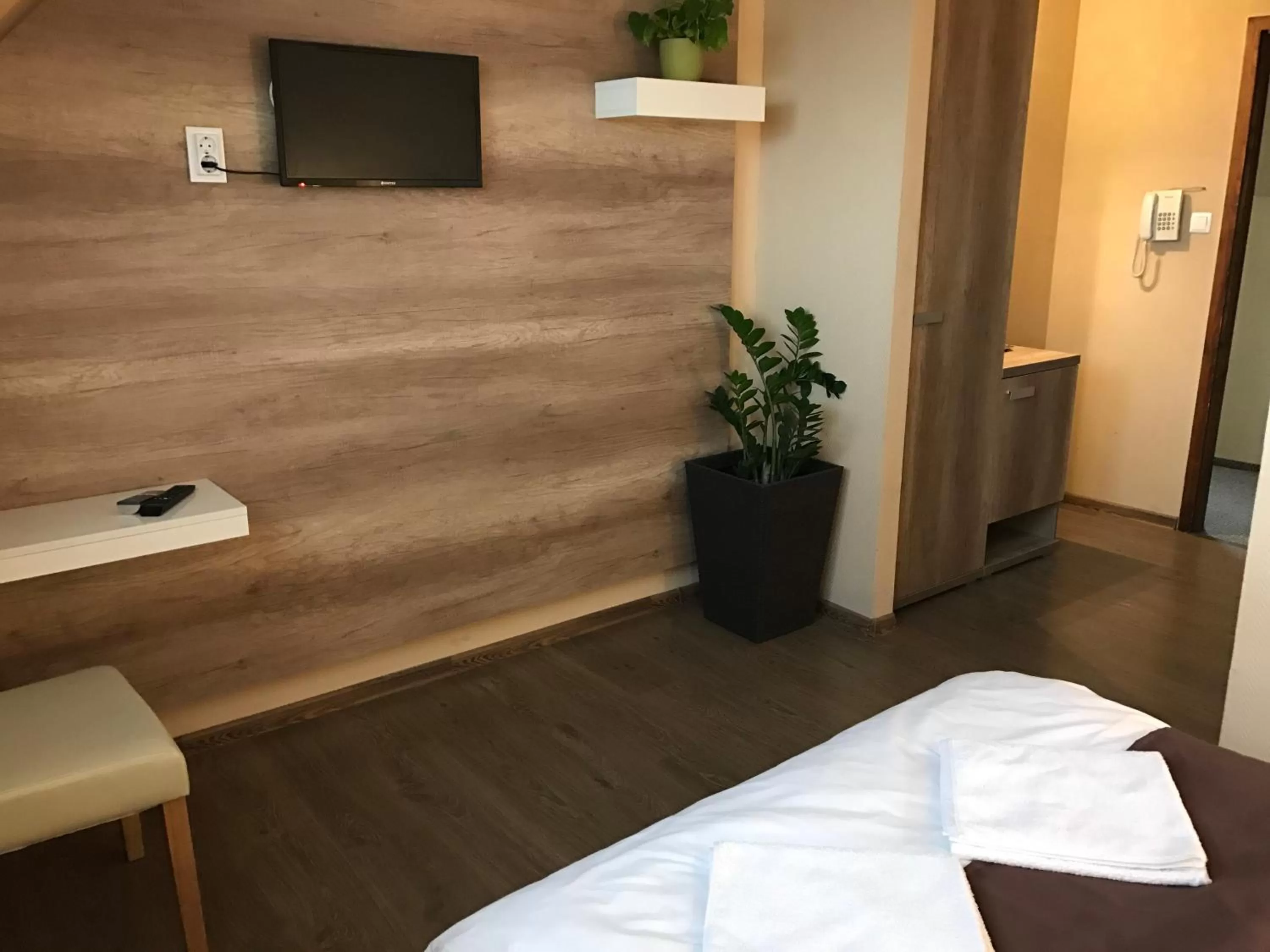 TV/Entertainment Center in Abszolút Hotel és Panzió