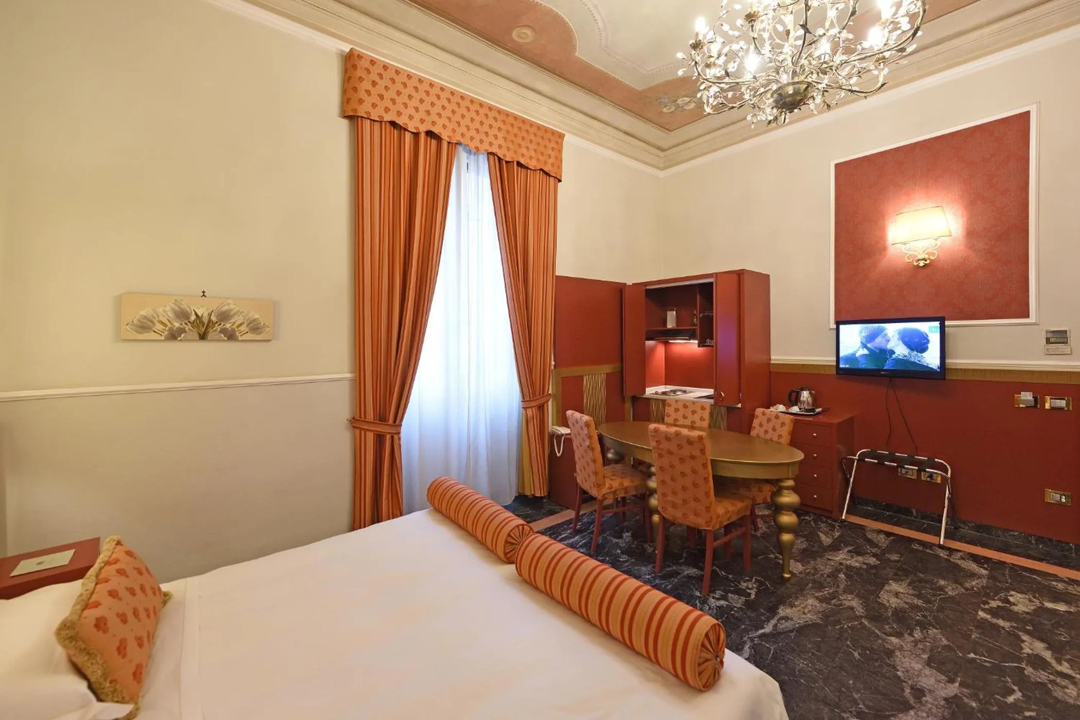 Kitchen or kitchenette, Bed in Relais La Corte di Cloris