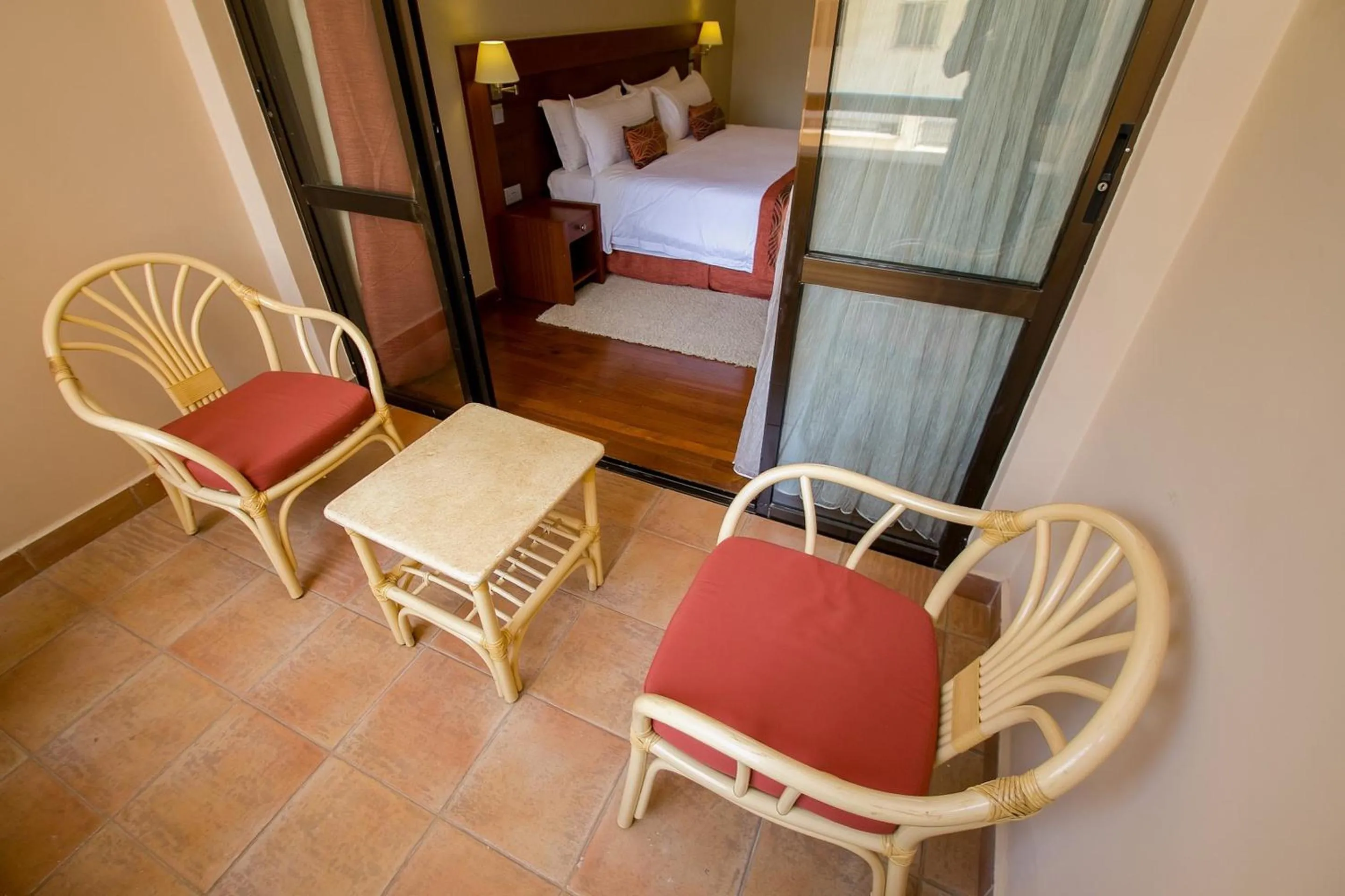 Balcony/Terrace, Bed in Waridi Paradise Hotel and Suites