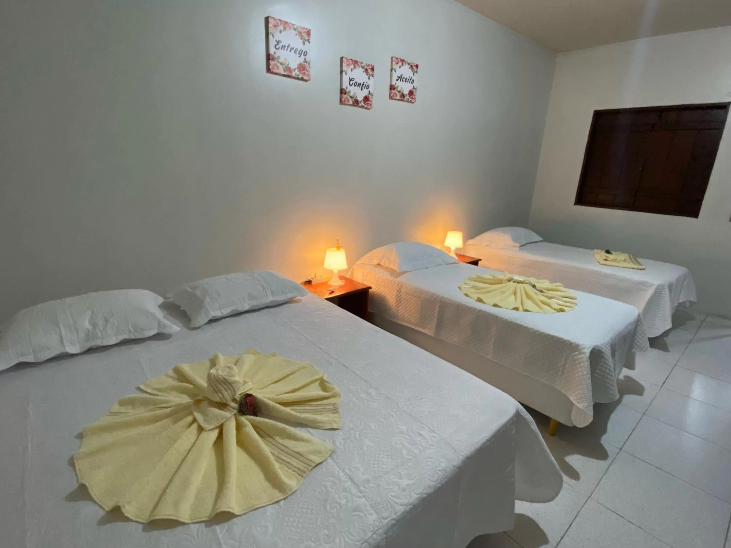 Bed in POUSADA ESTRELA DA MANHÃ