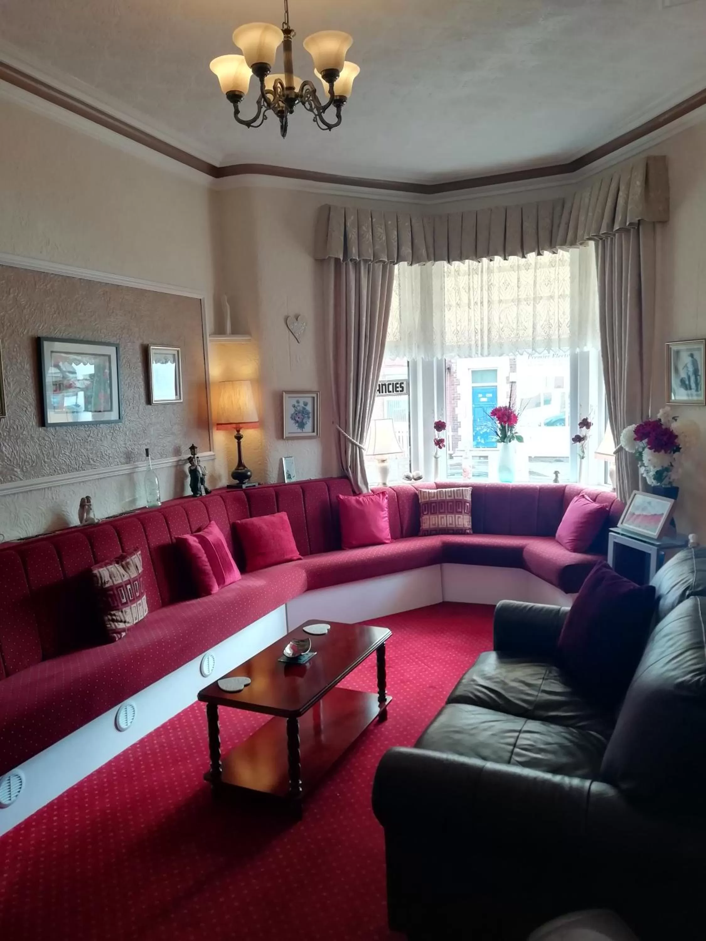 Communal lounge/ TV room in Shirley Heights Hotel